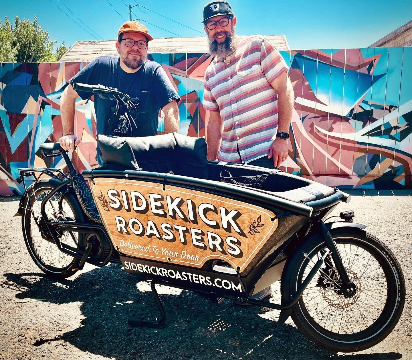 We are so excited to show the amazing custom artwork that @brush.house &amp; @sumner_signs did on our Sidekick Roaster Cargo Bike! We love it and we can&rsquo;t thank you enough!!! Custom hand painted wood signs, hand drawn topographic lines on the f