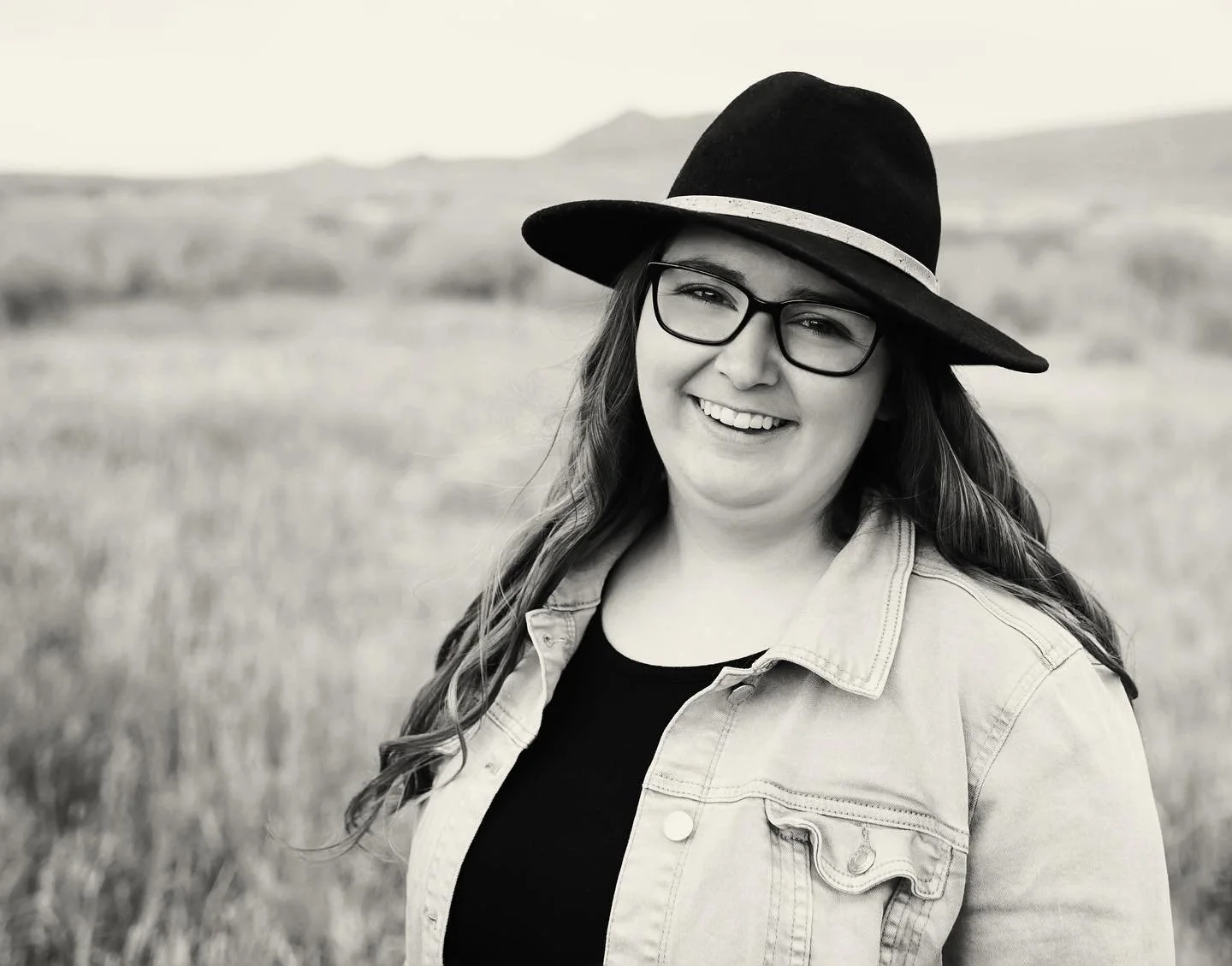 Smiling young woman in a Wyoming field
