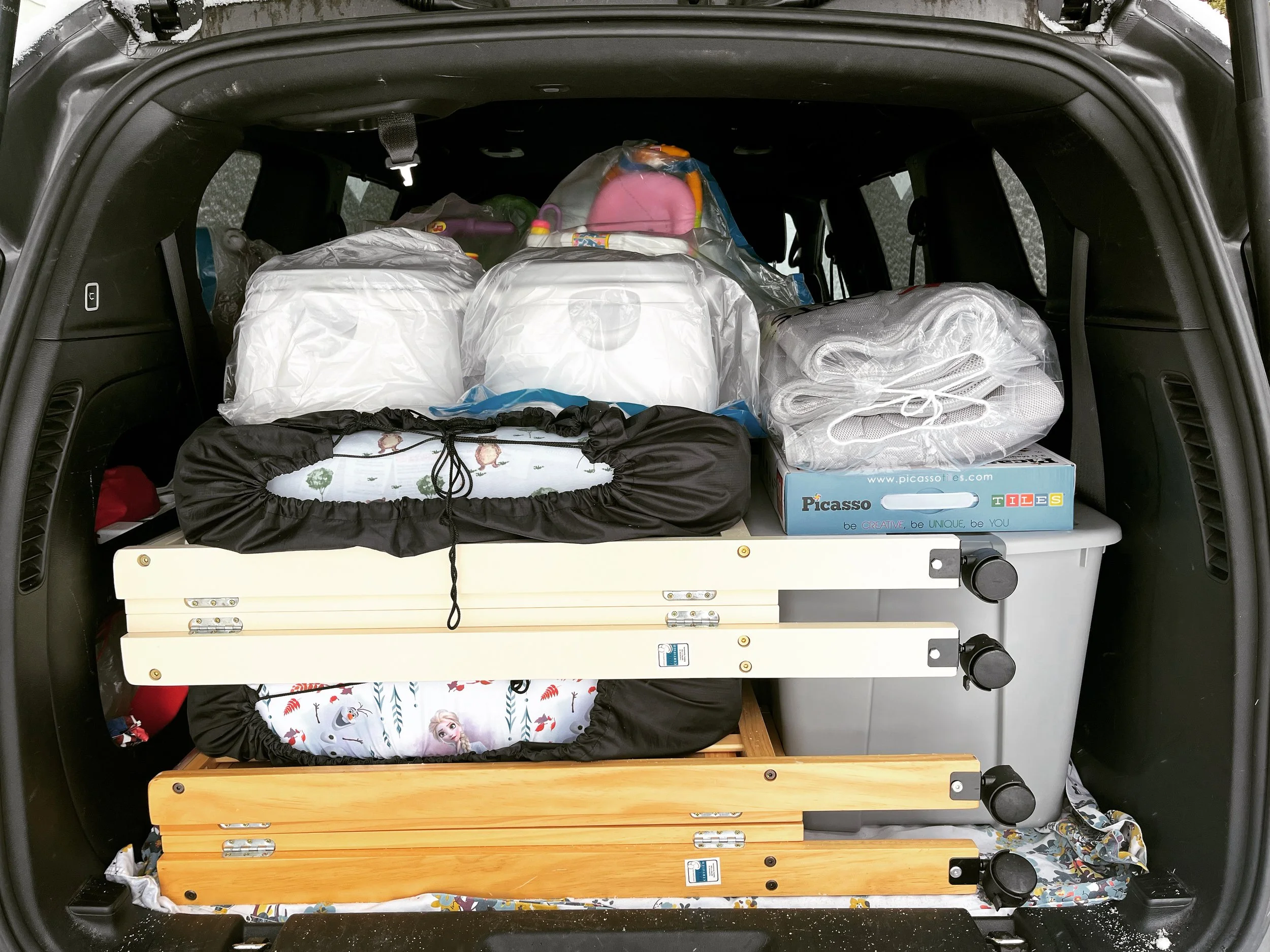 Fully packed car with full size cribs, potty chairs, toys, and Newton mattresses. Leave your gear at home and let us pack and deliver to you!