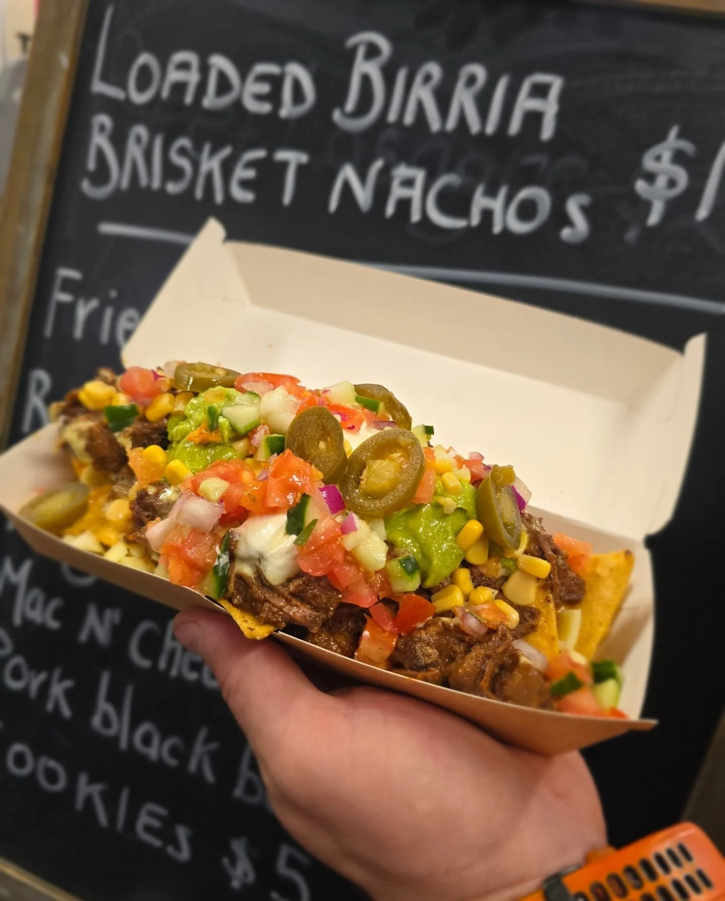 Back for hot lunch is our loaded birria brisket nachos. 
Slow cooked birria beef loaded ontop of cheesy nachos and all the trimmings. Cheese sauce, sour cream, pico de gallo, corn, avo and jalepenos are optional of course !! 
Available 9am until sold
