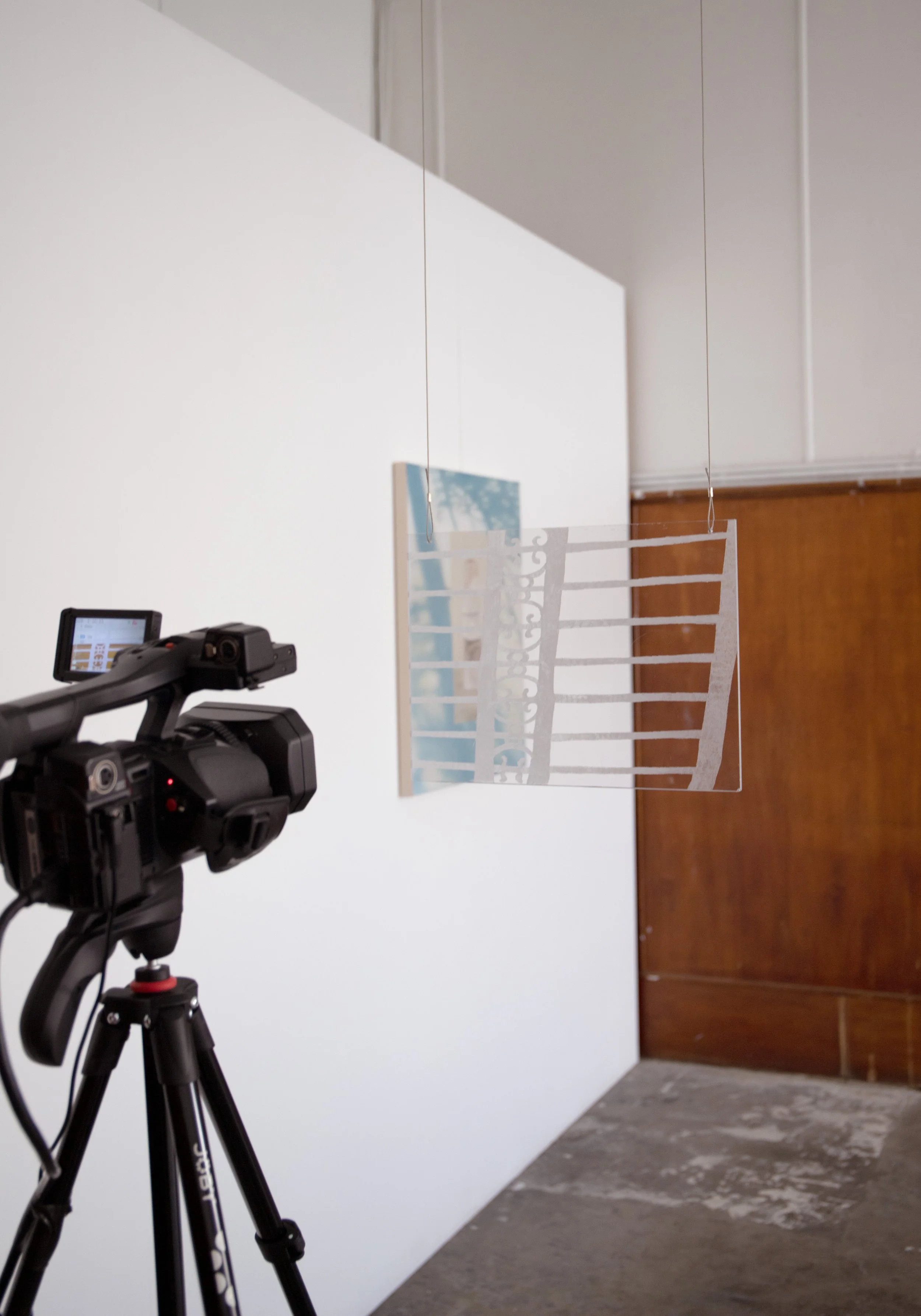 ‘Re-view’, live stream camera, projector, etched polycarbonate, 2025, 138 Gallery