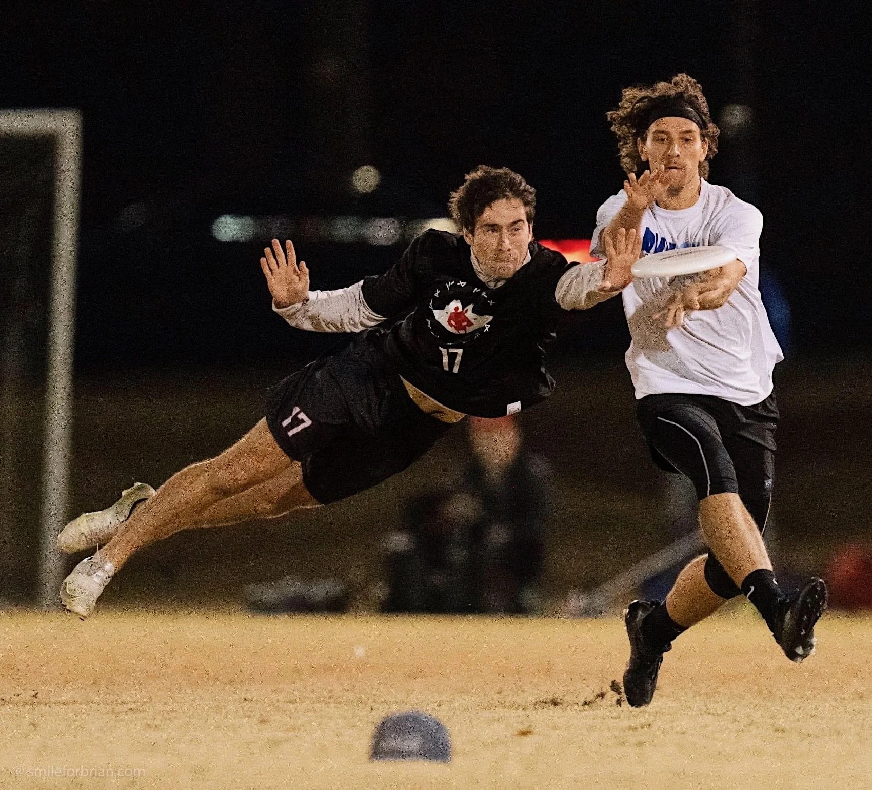 Author's son John Laney (on left) laying out to block a throw