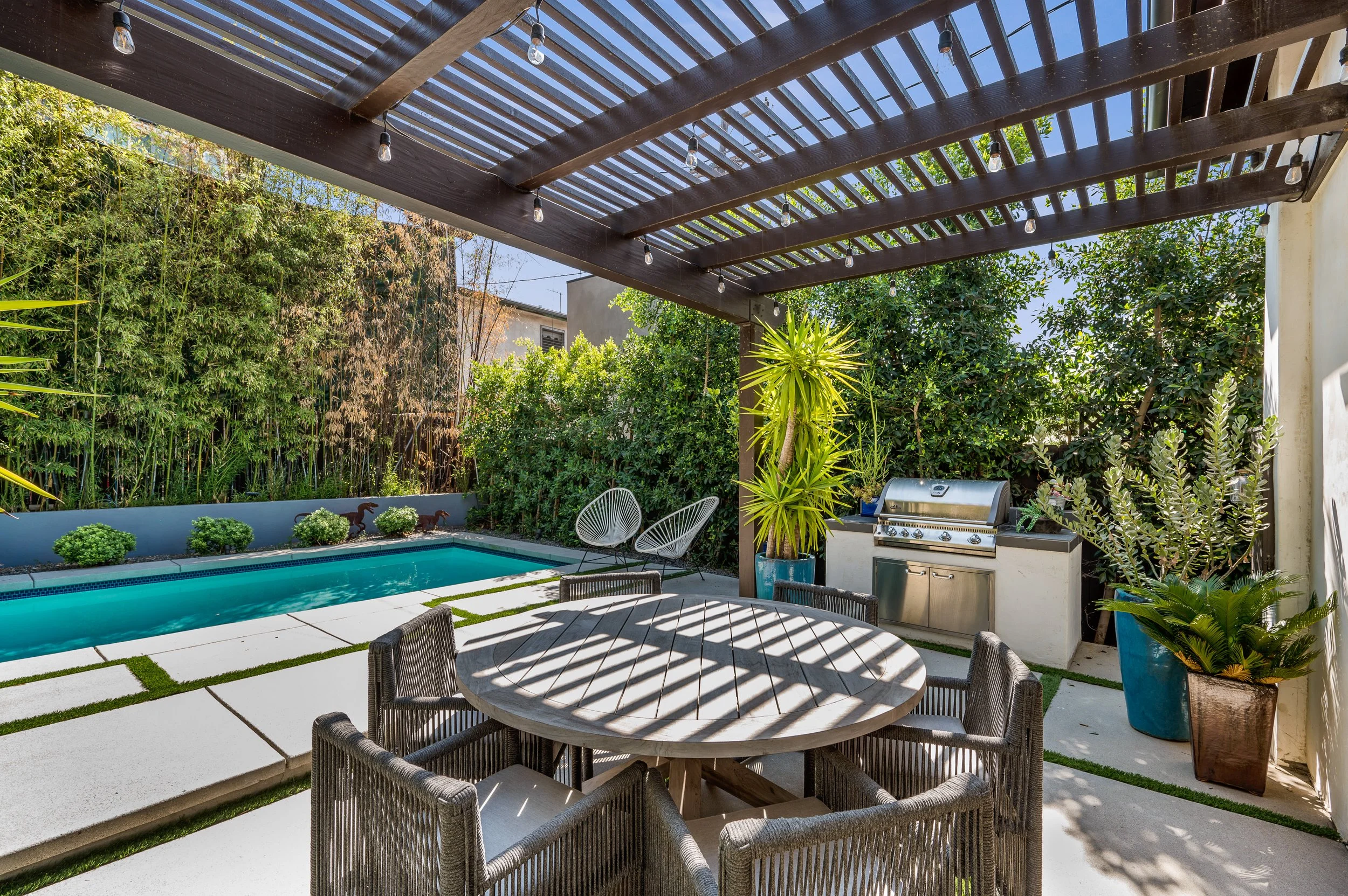 Pool and outdoor living design with functional layout and style