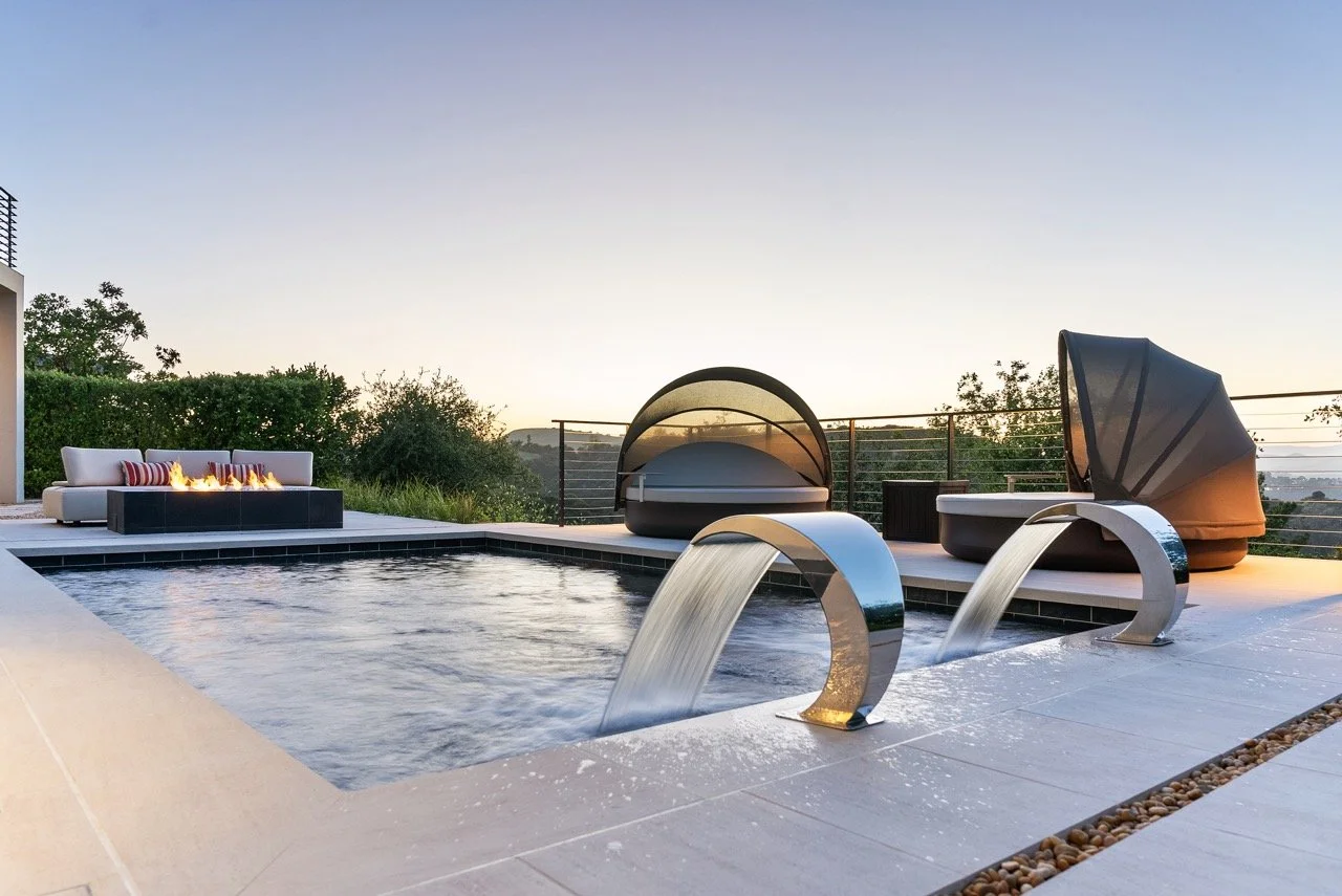 Custom pool and backyard project in Calabasas, CA, featuring a modern design-build approach with a focus on clean lines, premium materials, and a fully integrated outdoor living space. This project highlights custom pool construction, refined hardsca