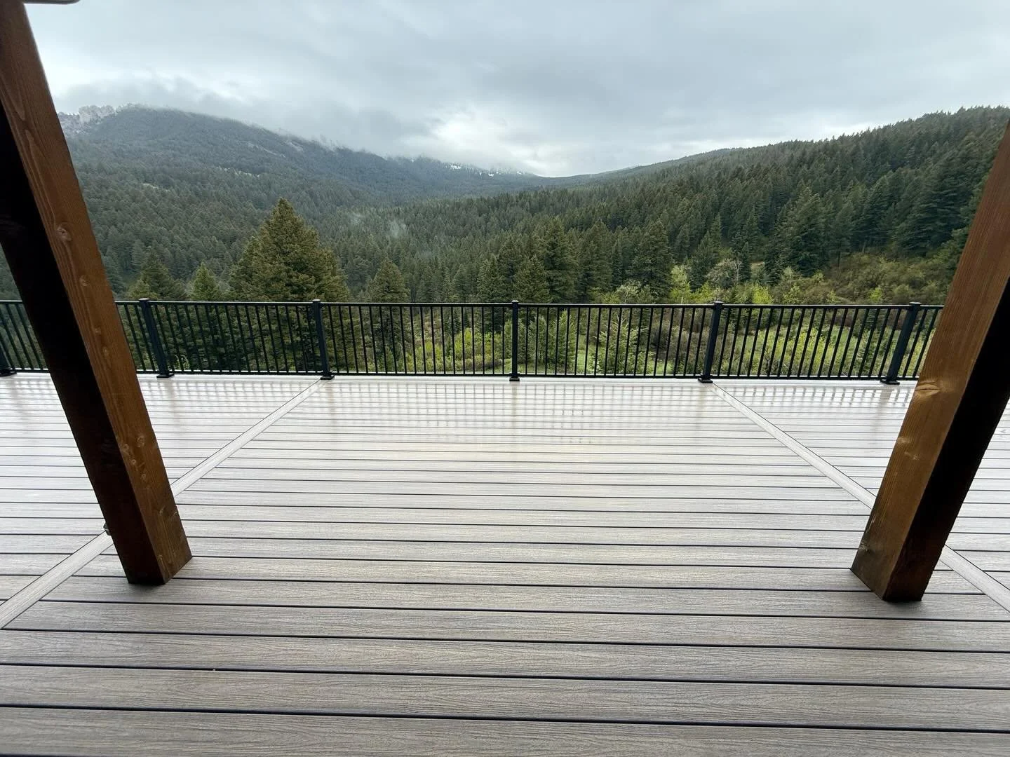 Imagine having a cup of coffee with this view every day ☁️ 🌲 swipe to see the before pictures and how we made this deck safe and secure!  @fe_c_foundations #bozeman  #helicalpile #bozemanmontana #bigskyconstruction #bigskymontana