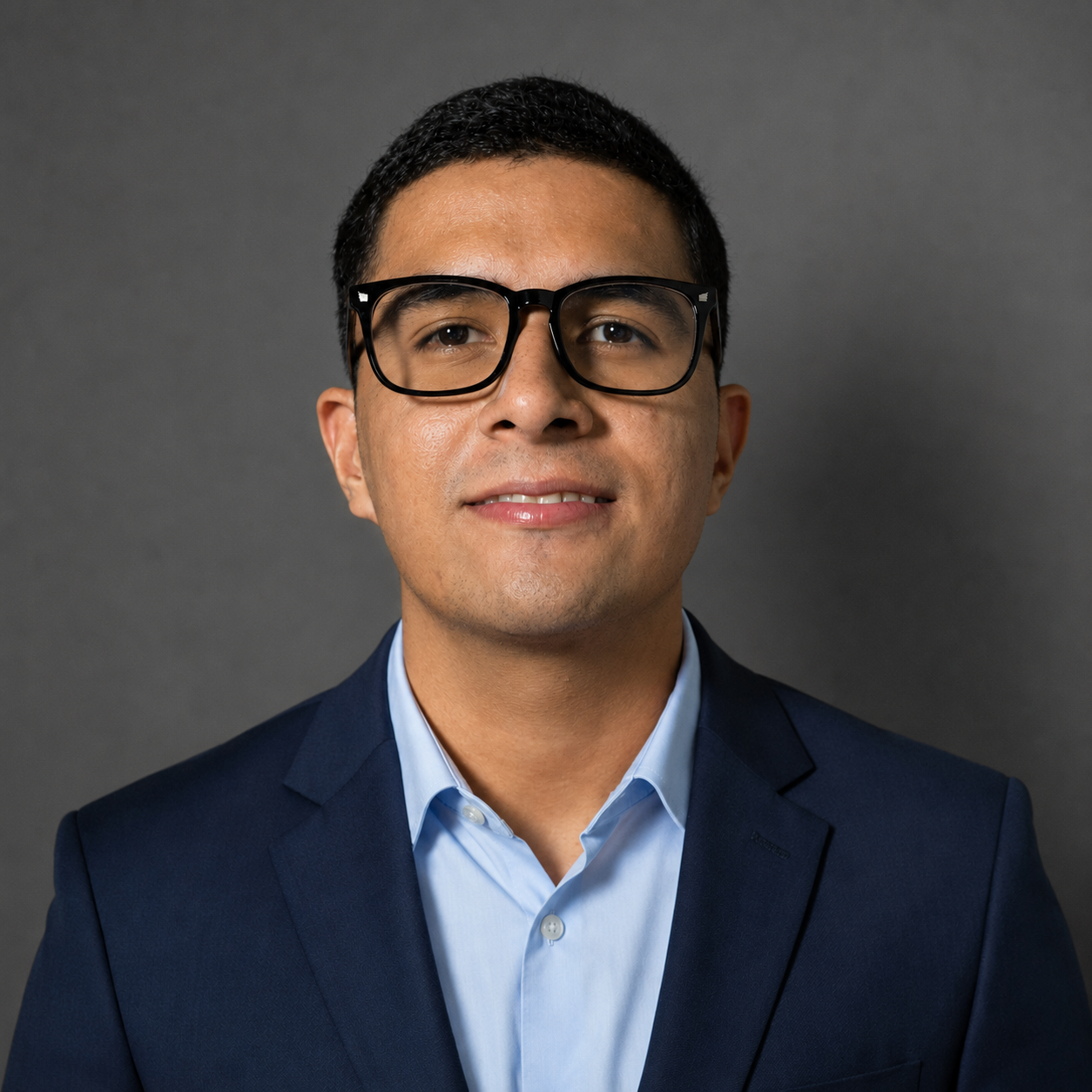 smiling young man with glasses professional