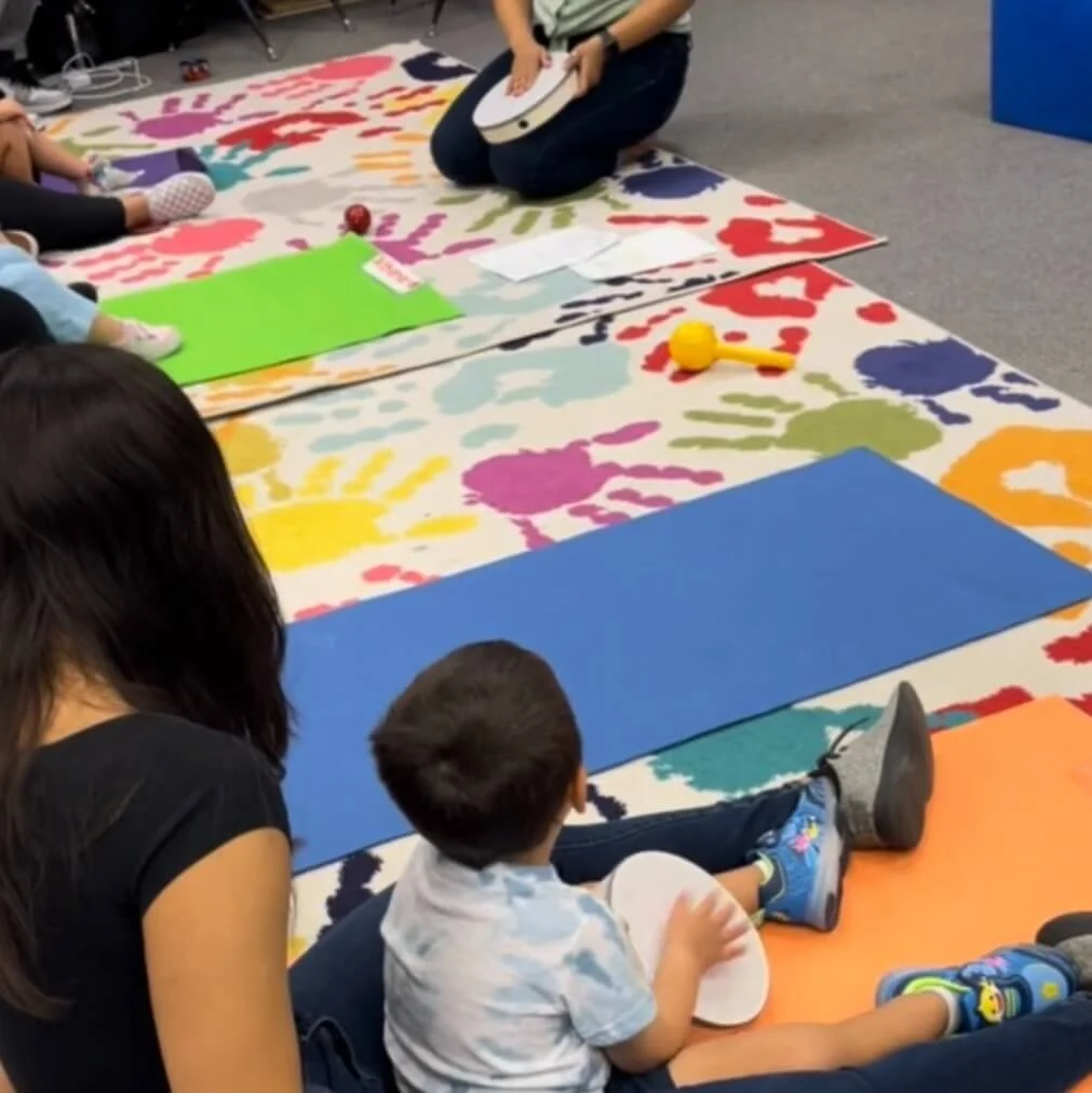 Brave Wings occupational therapist teaching music to children at Kean University