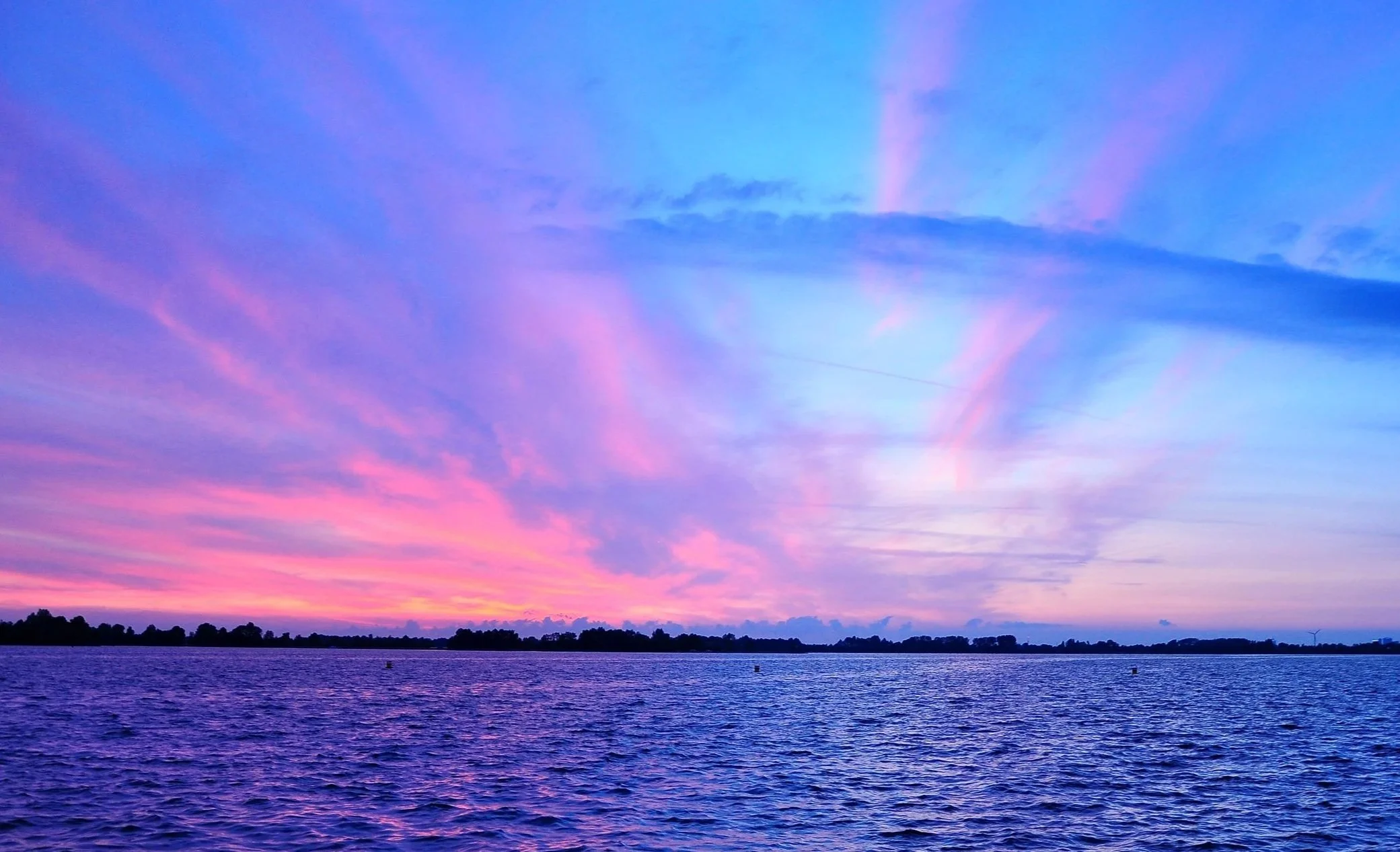 Purple and pink sunrise over a lake