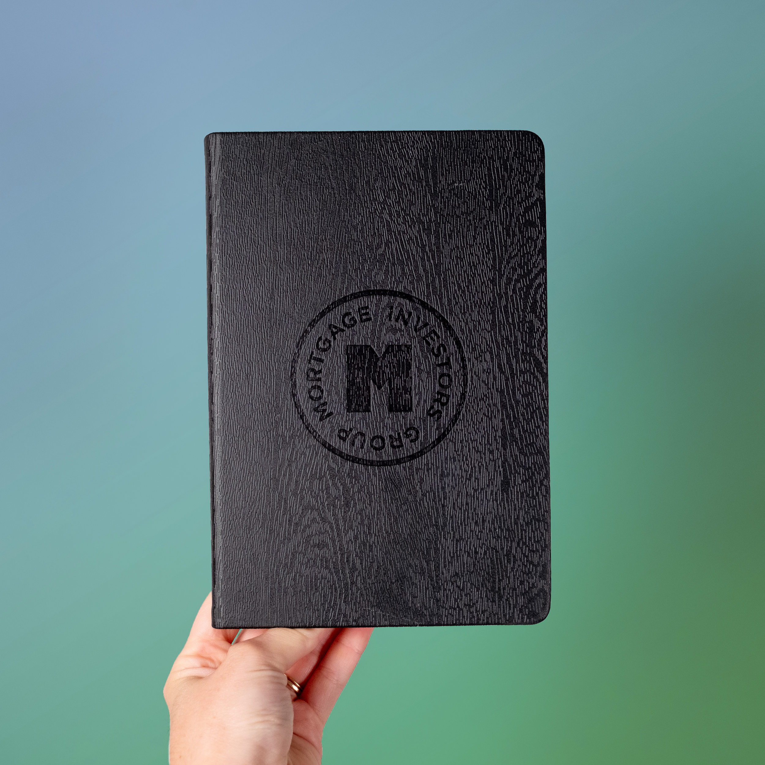MIGMerch2022-WoodgrainJournal1-MIG.png