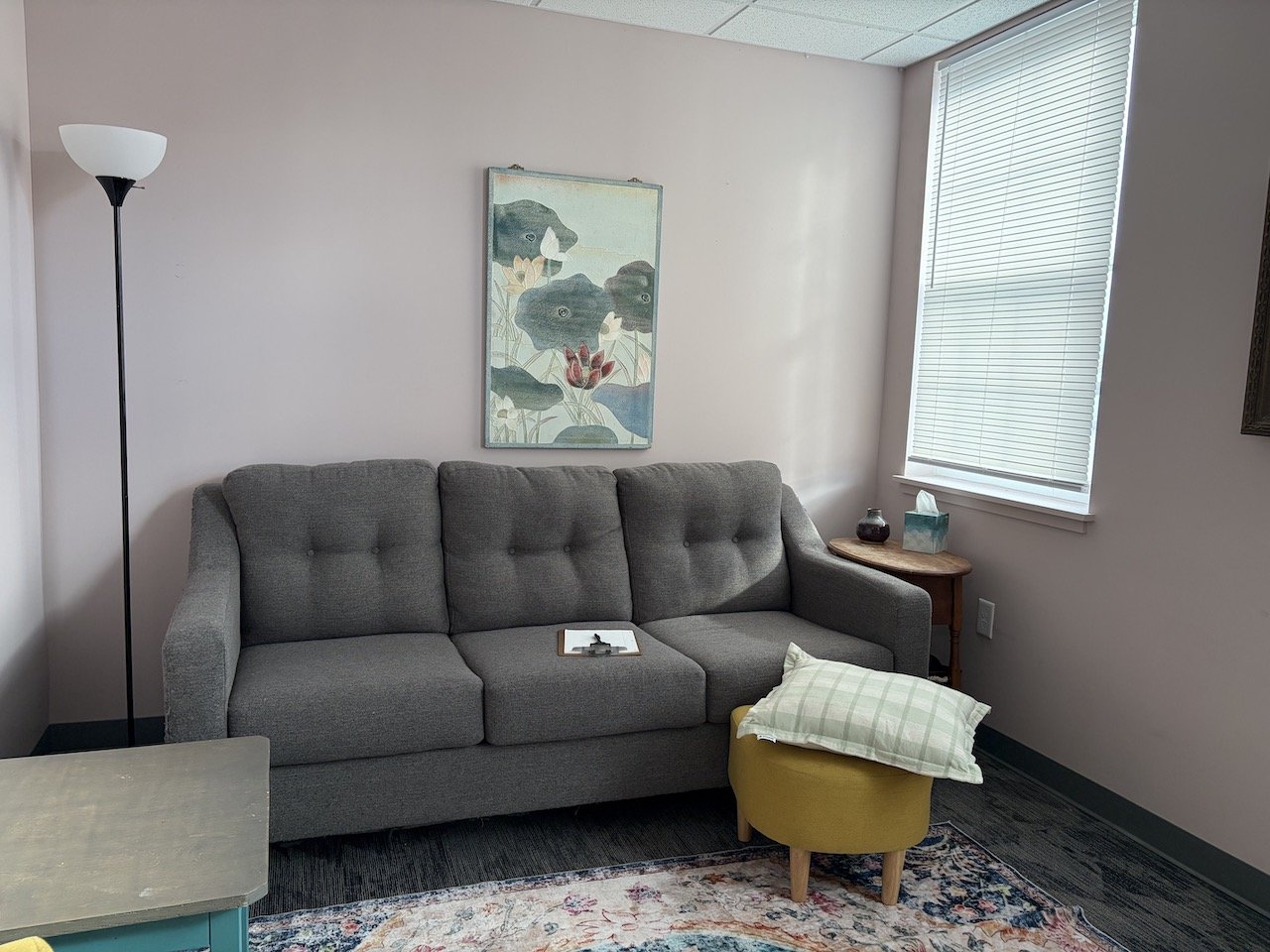 therapy room with couch and stools