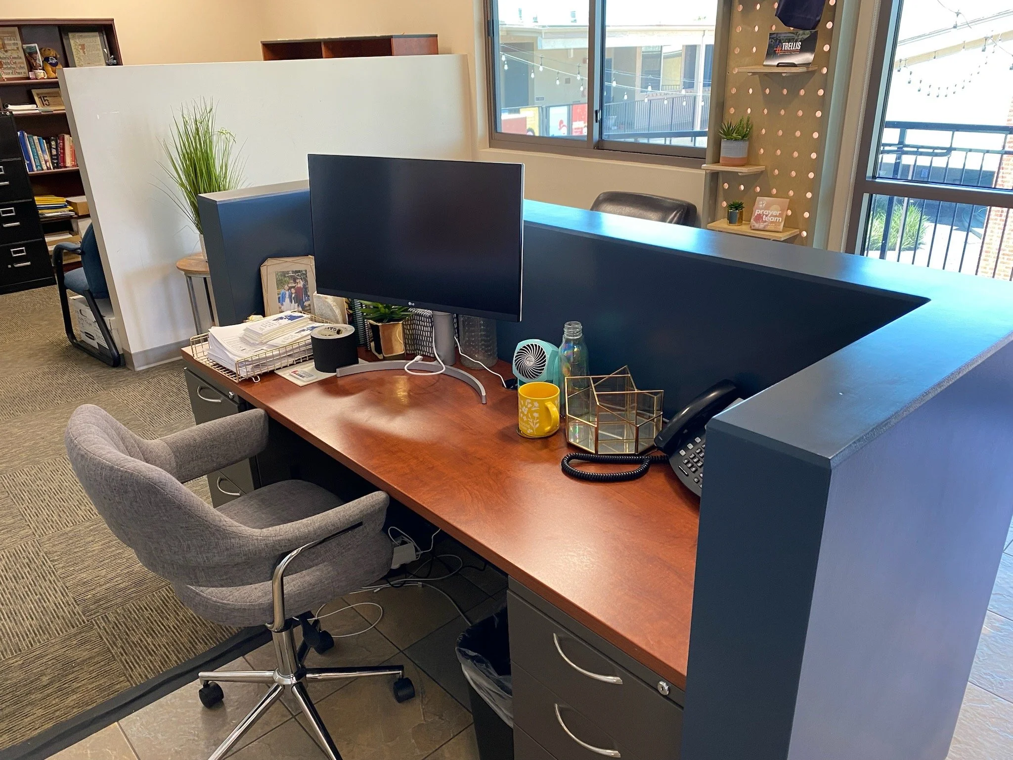 reception desk facade with lighting under toekick