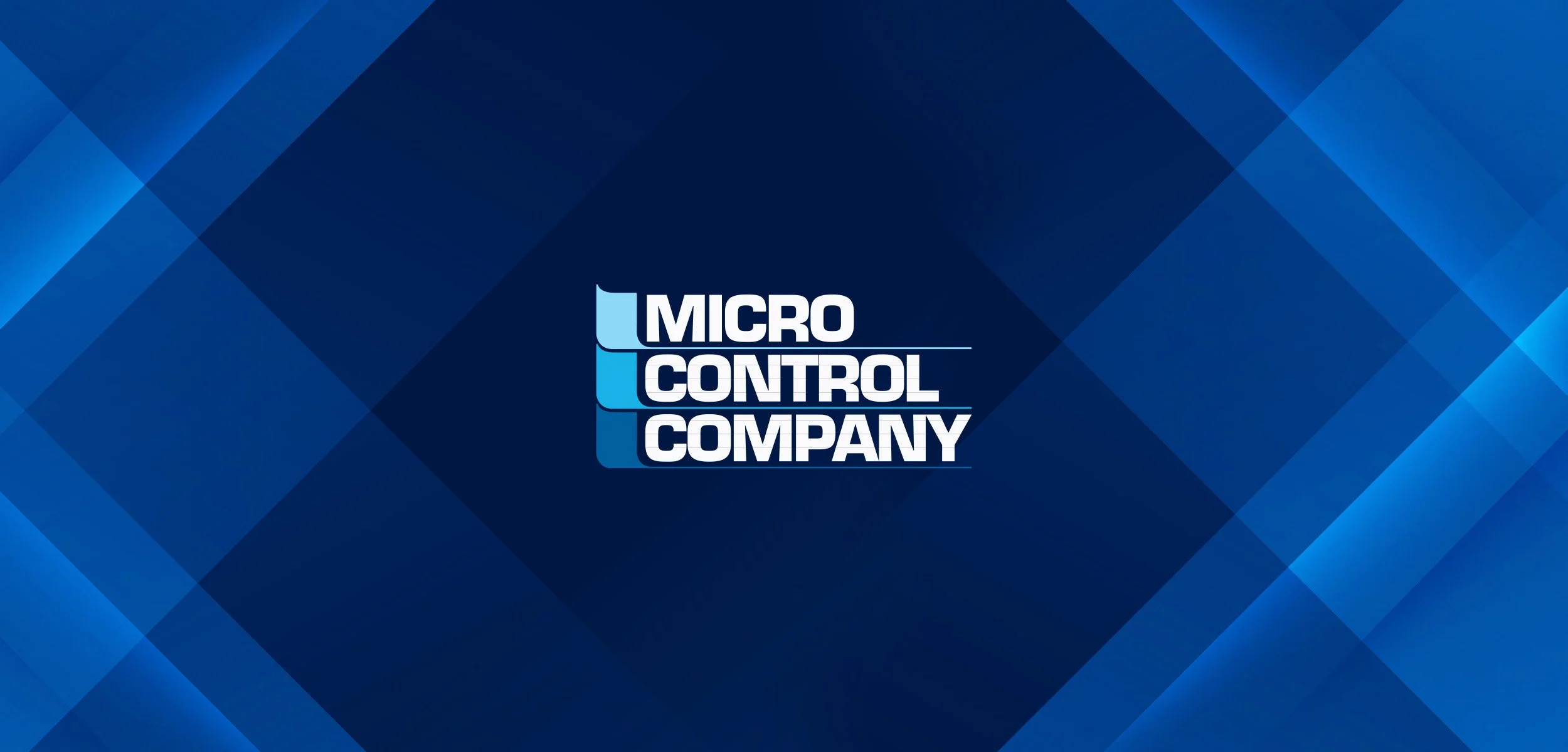 Blue geometric background with the text 'Micro Control Company' stacked vertically in white and light blue letters.