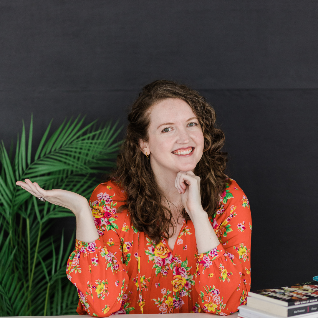 Redesignia founder Kristen Morris in front of black background