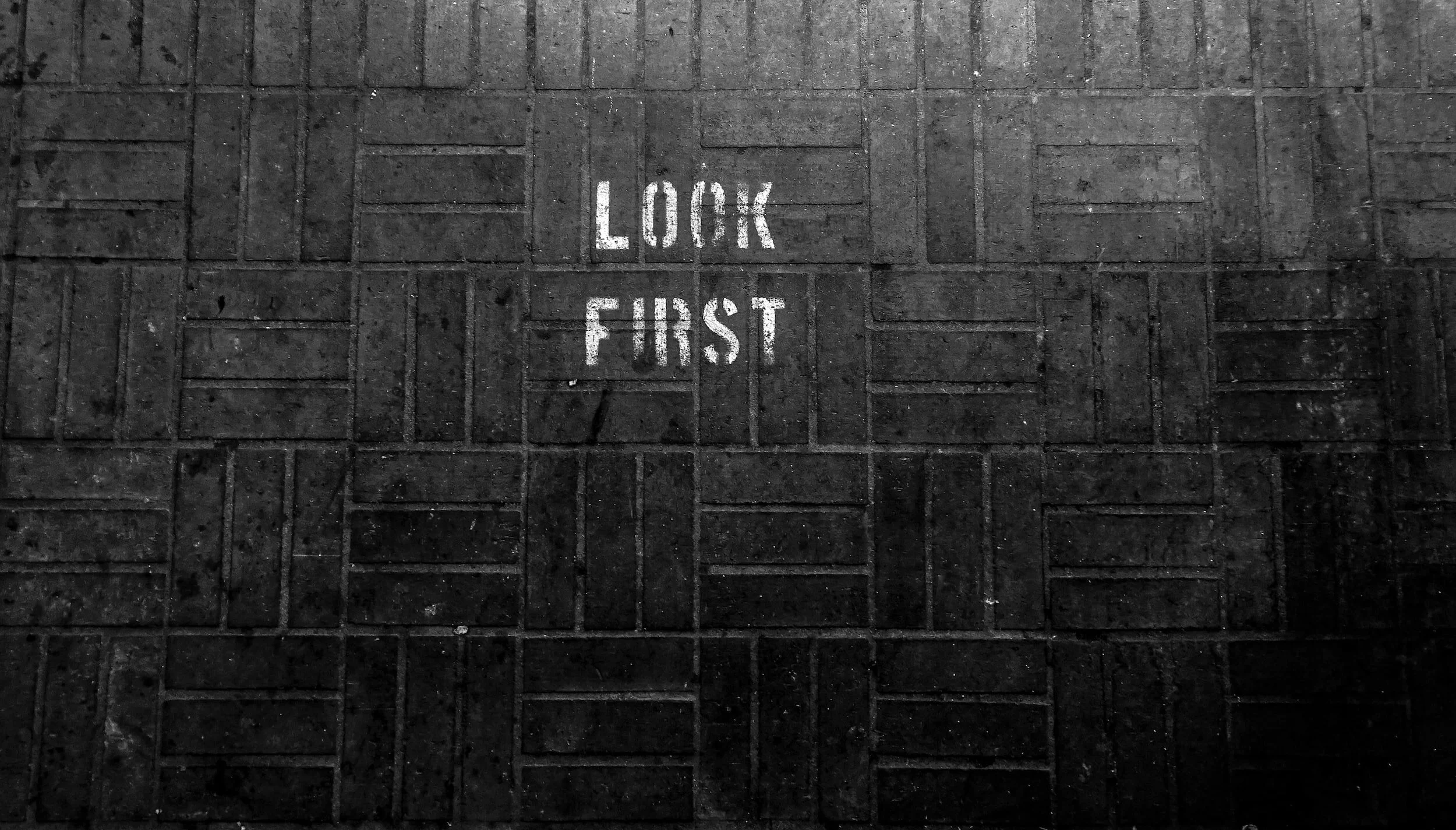 Look first sign on tiles. Look before you leap.
