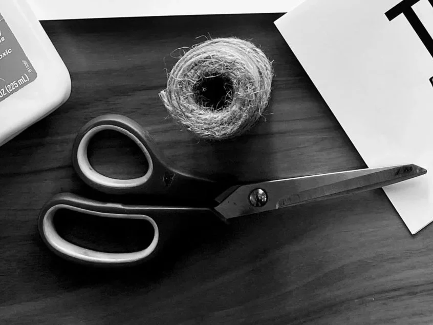 Scissors, roll of twine