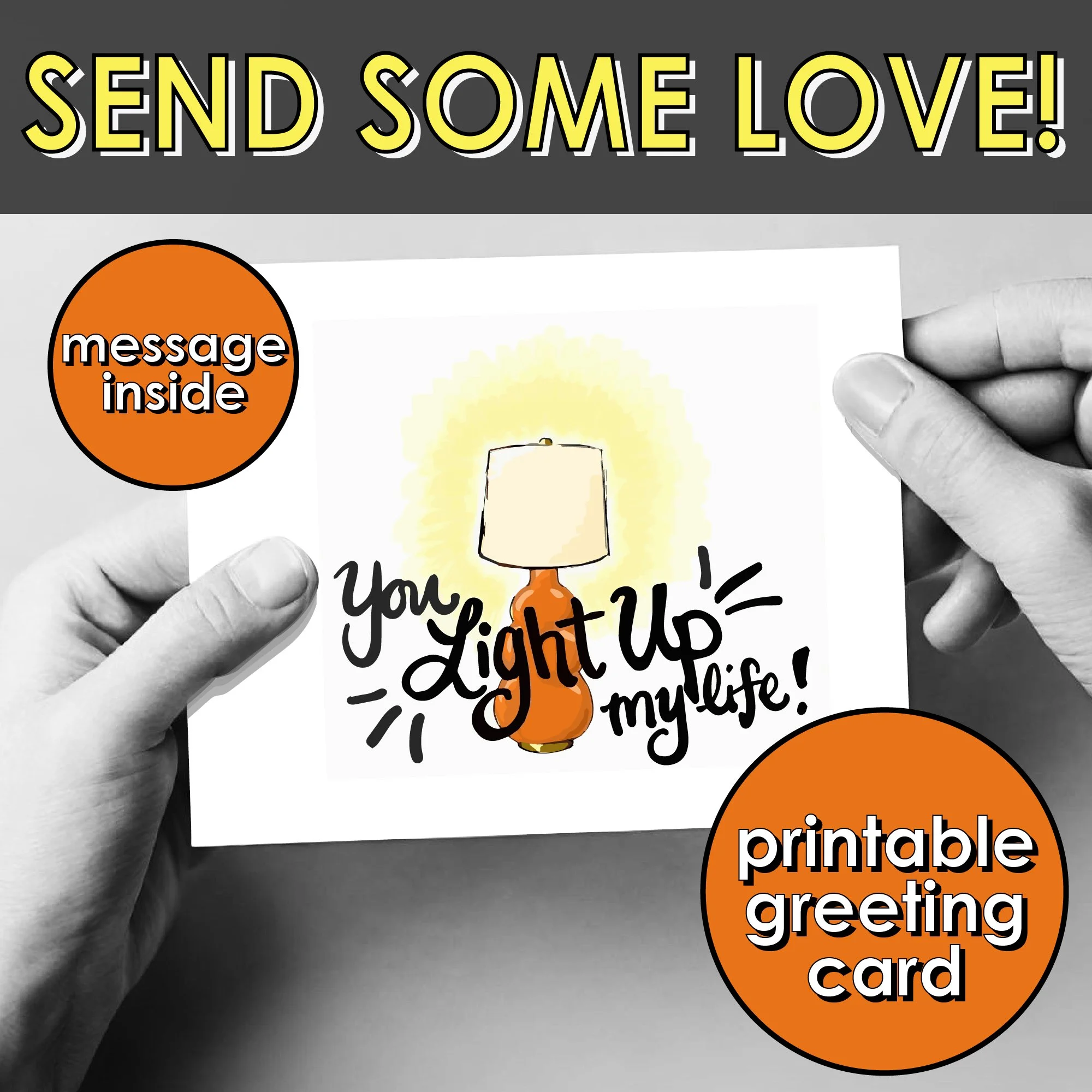 Hands holding a printable greeting card reading "You Light Up My Life"