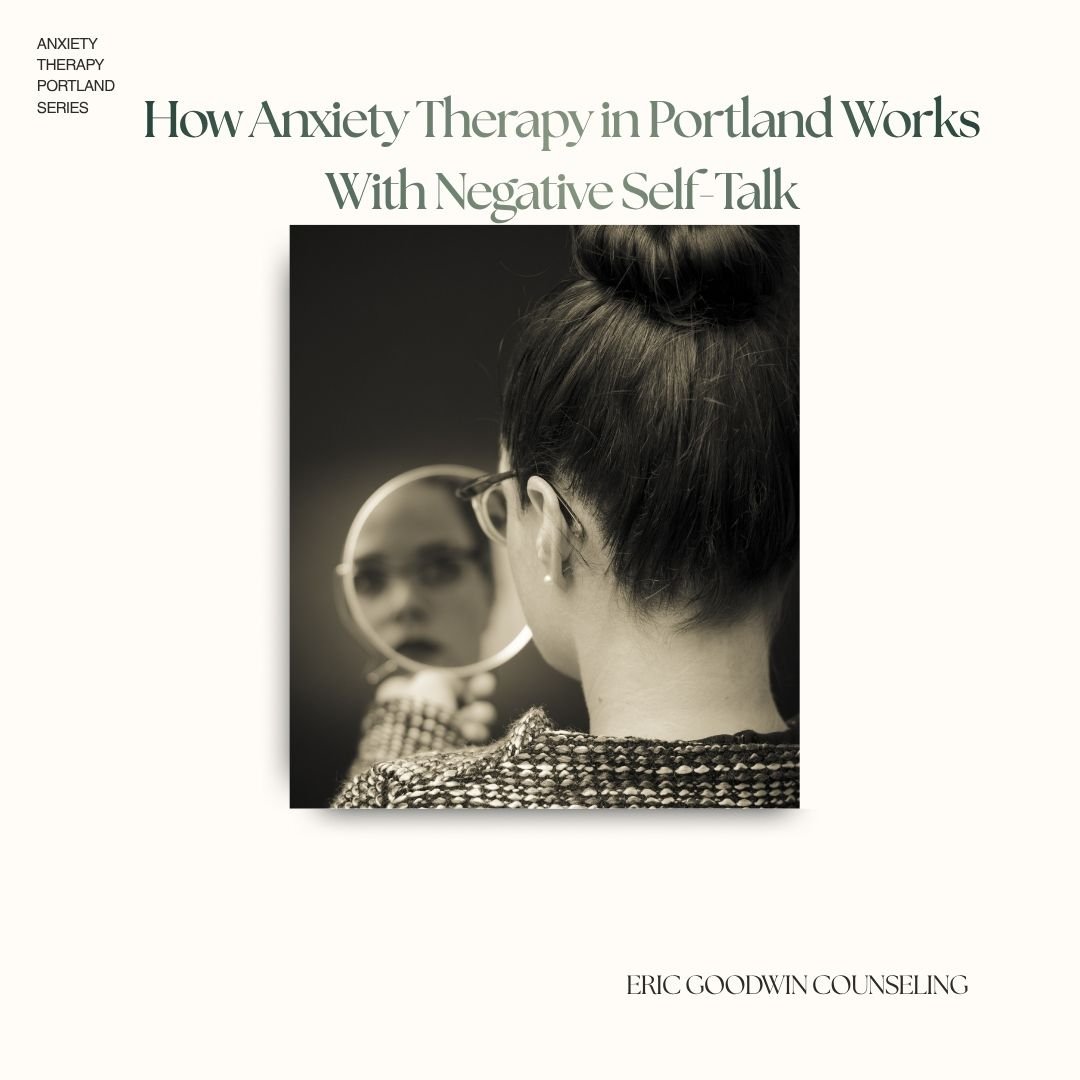 Person looking at themselves in a handheld mirror, reflecting on inner thoughts and self-talk, representing anxiety therapy in Portland.