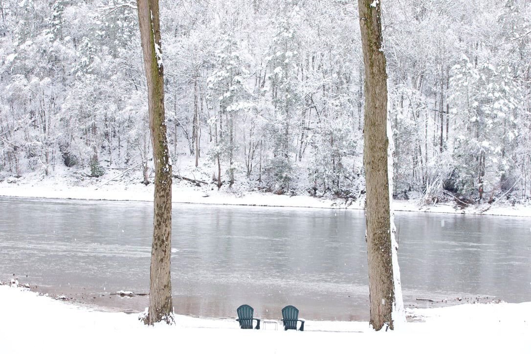 Chair on River in Winter_Mission Possible Airbnb_NarrowsburgNY.jpeg