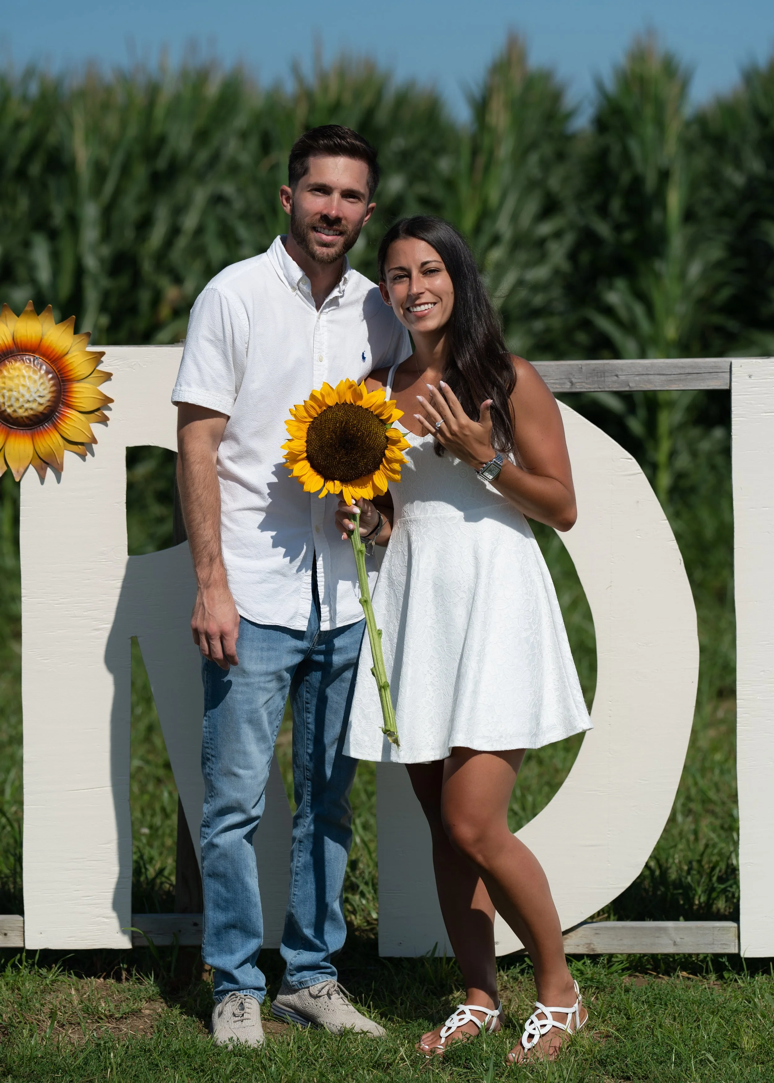 Jamie and Ryan in front of sign.jpg