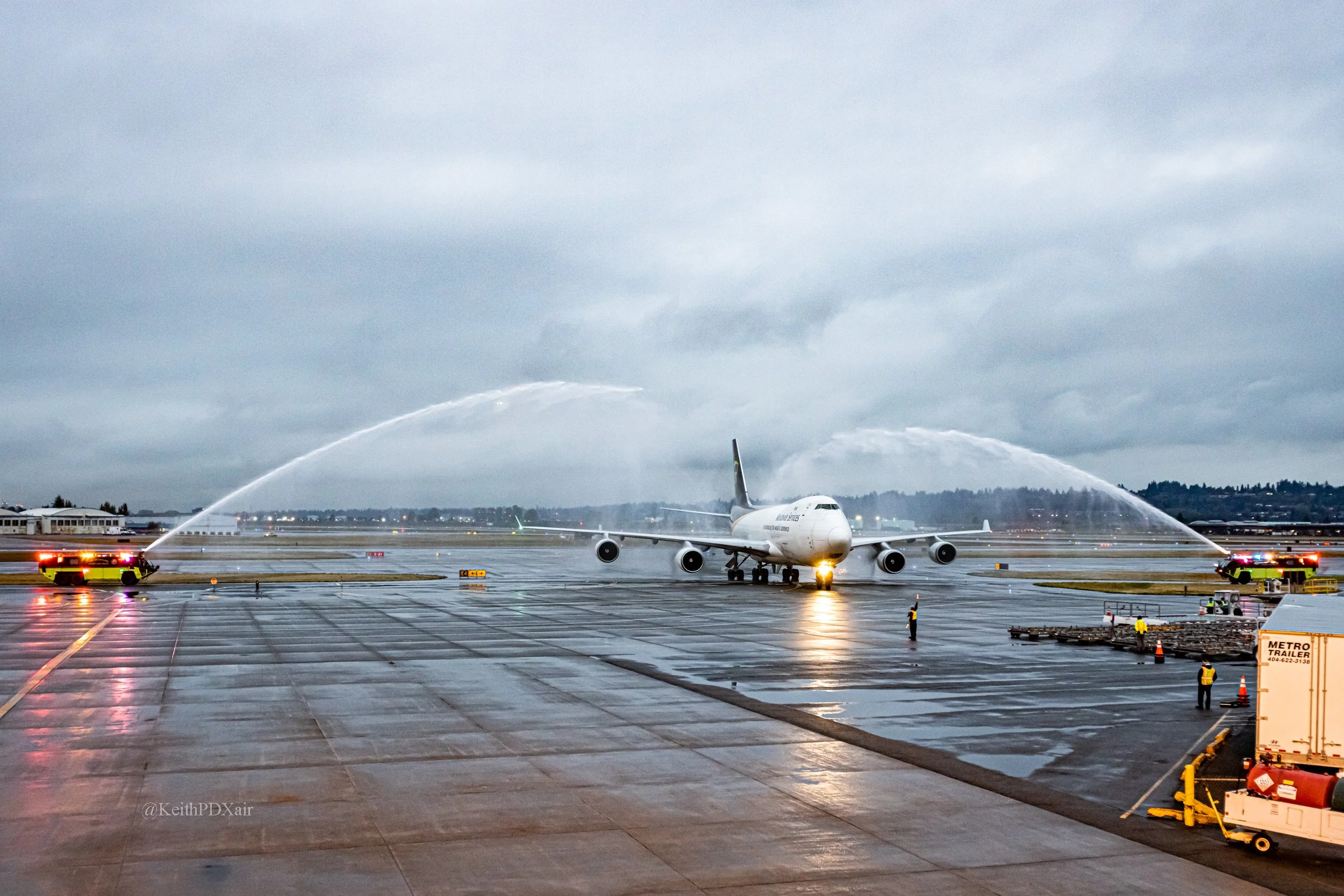 4526 UPS N583UP 747-4 Arriving from SDF.  Celebrating retiring Captain with the help of Port of Portland Fire 10/28/2022