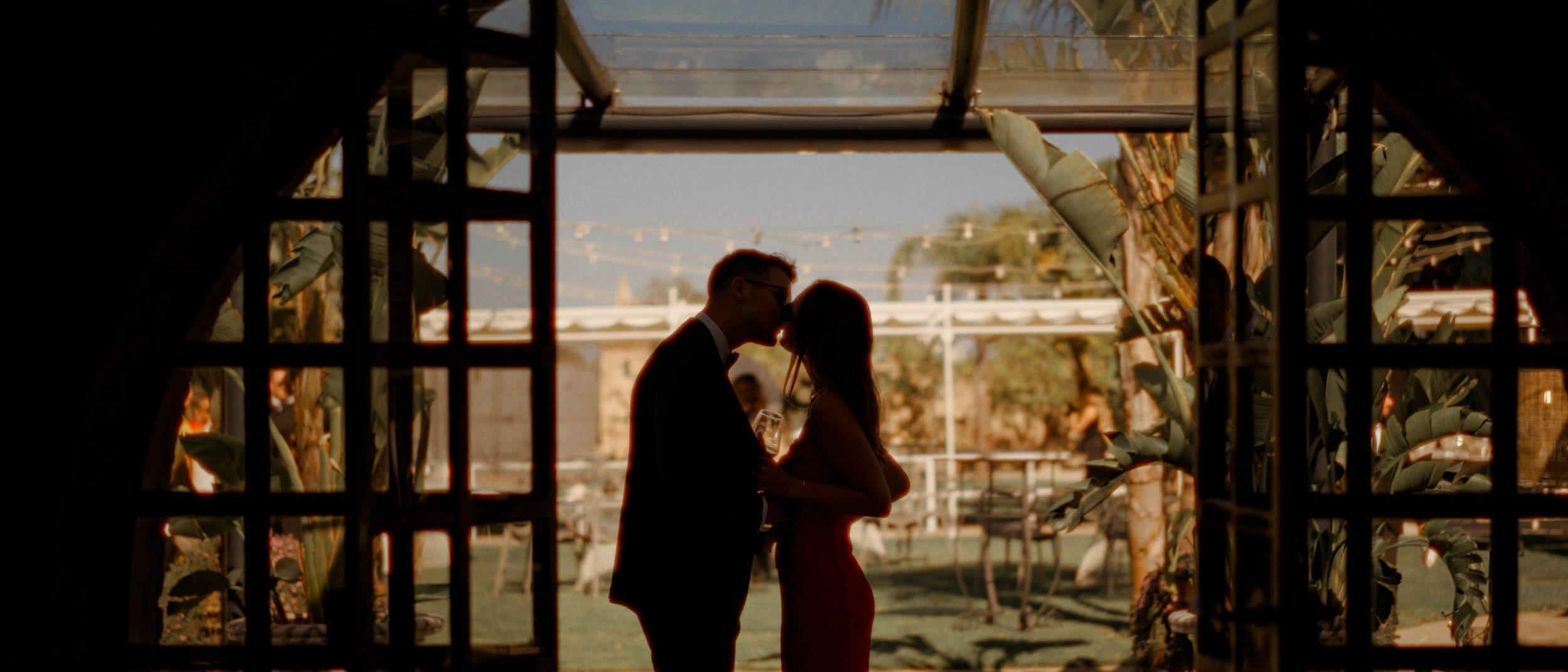 Couple kiss at Castello Monaci