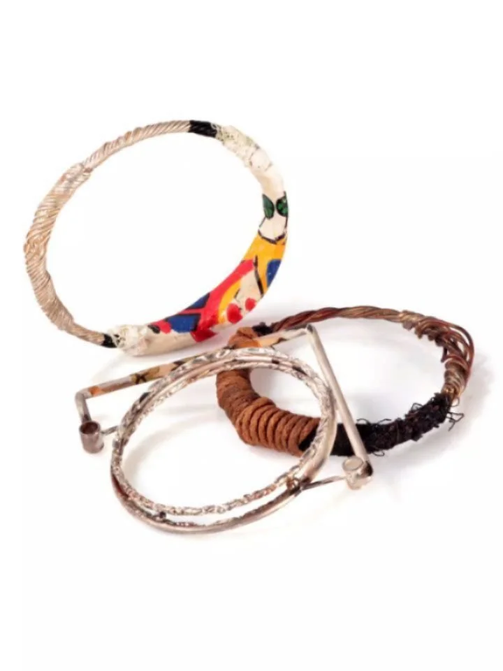 Private House: A series of bangles derived from a response to the 1904 manual 'Private House Electric Lighting', combined with traces of the London house in which I was living at the time. 
This series was produced through the combination of wire-wor