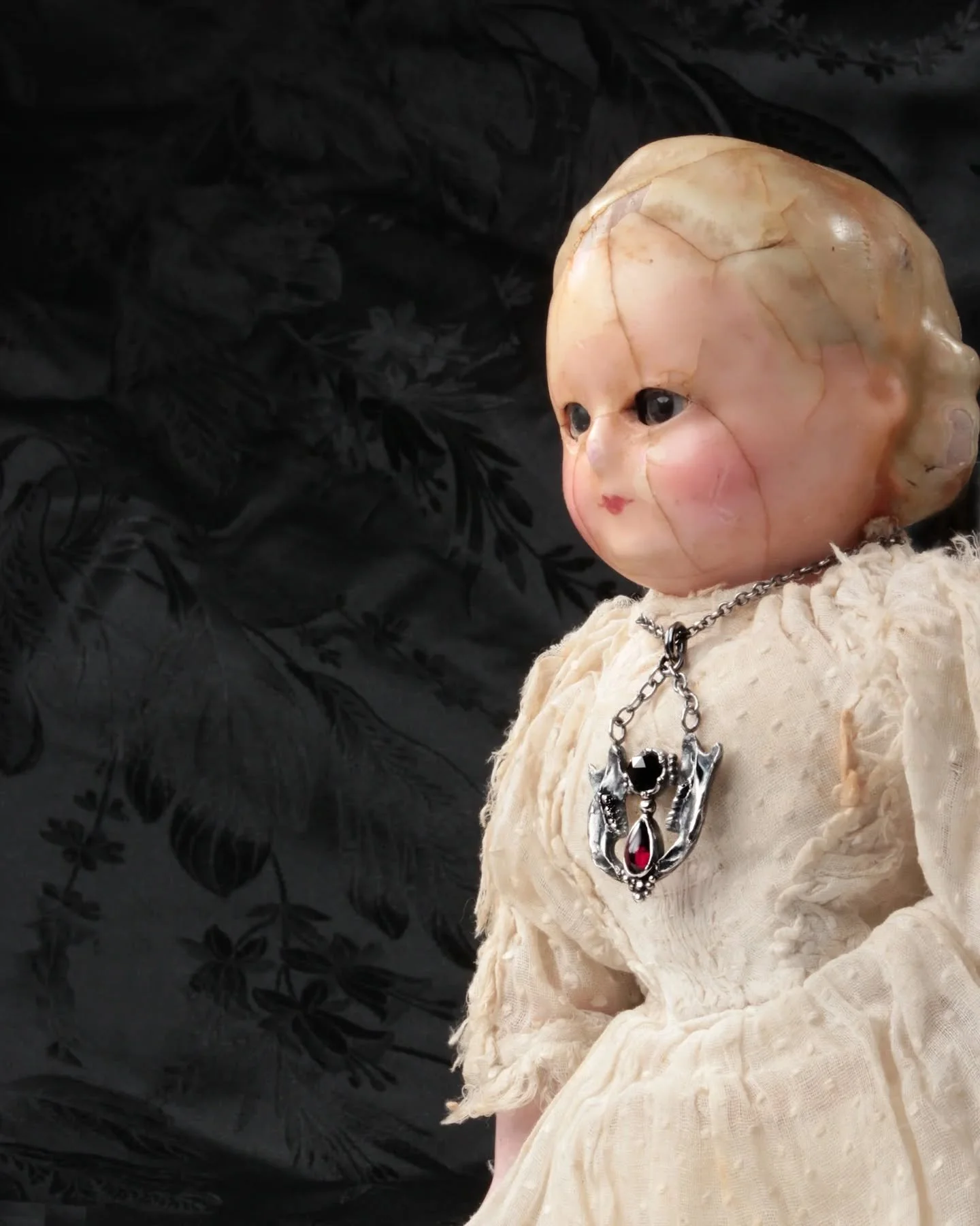 It's October, so I'm allowed to post some of the darker things I do. This year, I'm going to *treat* you to creepy dolls.
I've used dolls in my work since very early on, often adapting them or using parts to combine with other elements. Some of my ea