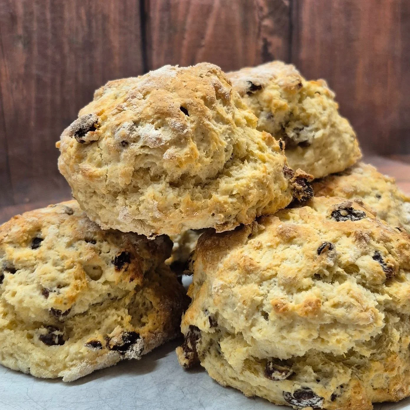 Fresh out of the oven. ❤️

No factory mixes.
No shortcuts.
No frozen deliveries.

Just our homemade fruit scones, baked right here in our kitchen using the same recipe we've been making for years.

Golden on the outside, light and fluffy in the middl