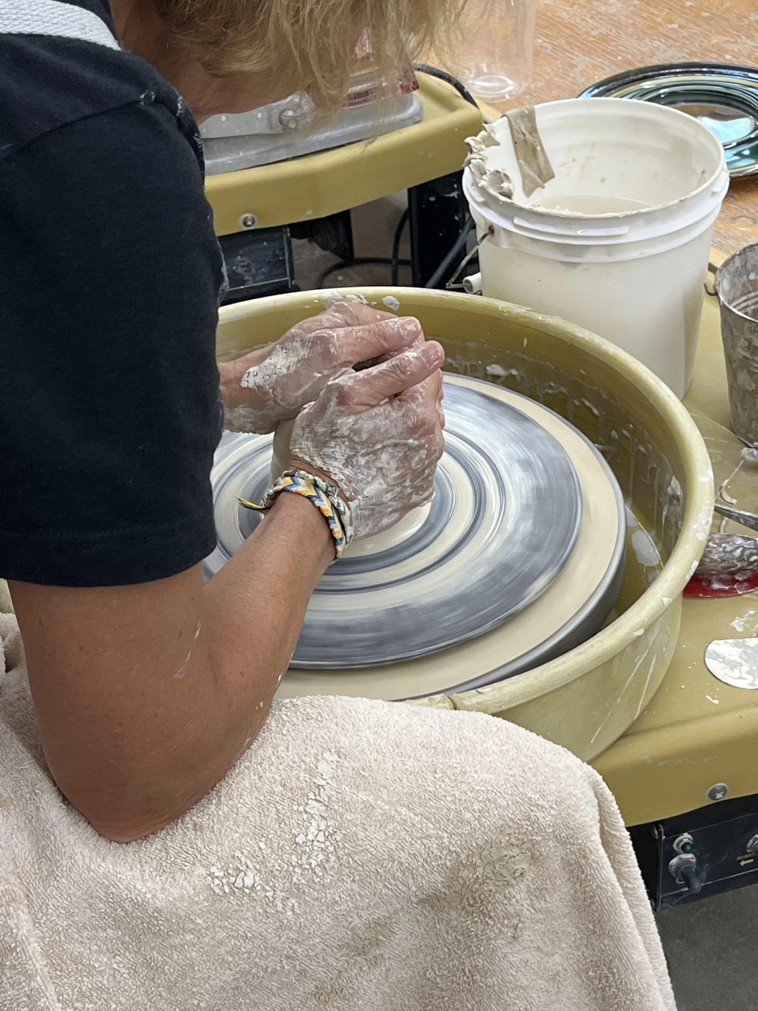 student_using_pottery_wheel.jpg