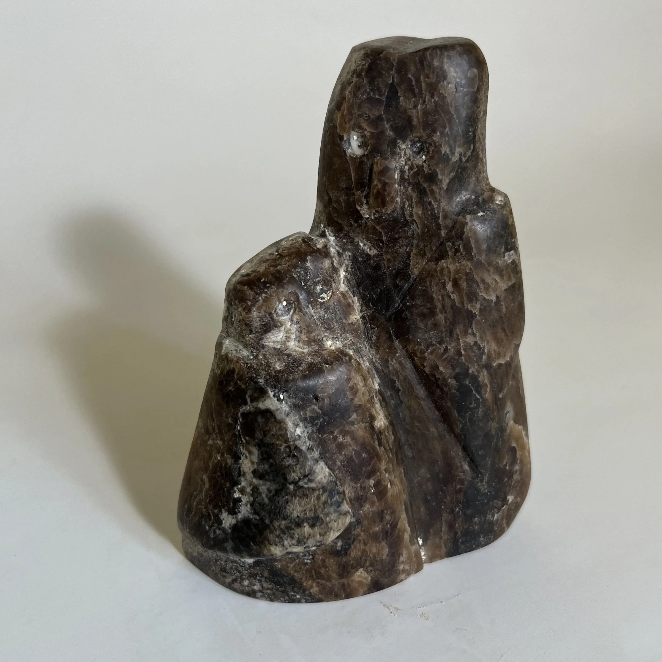 soapstone figurine of an owl and her chick sitting next to each other
