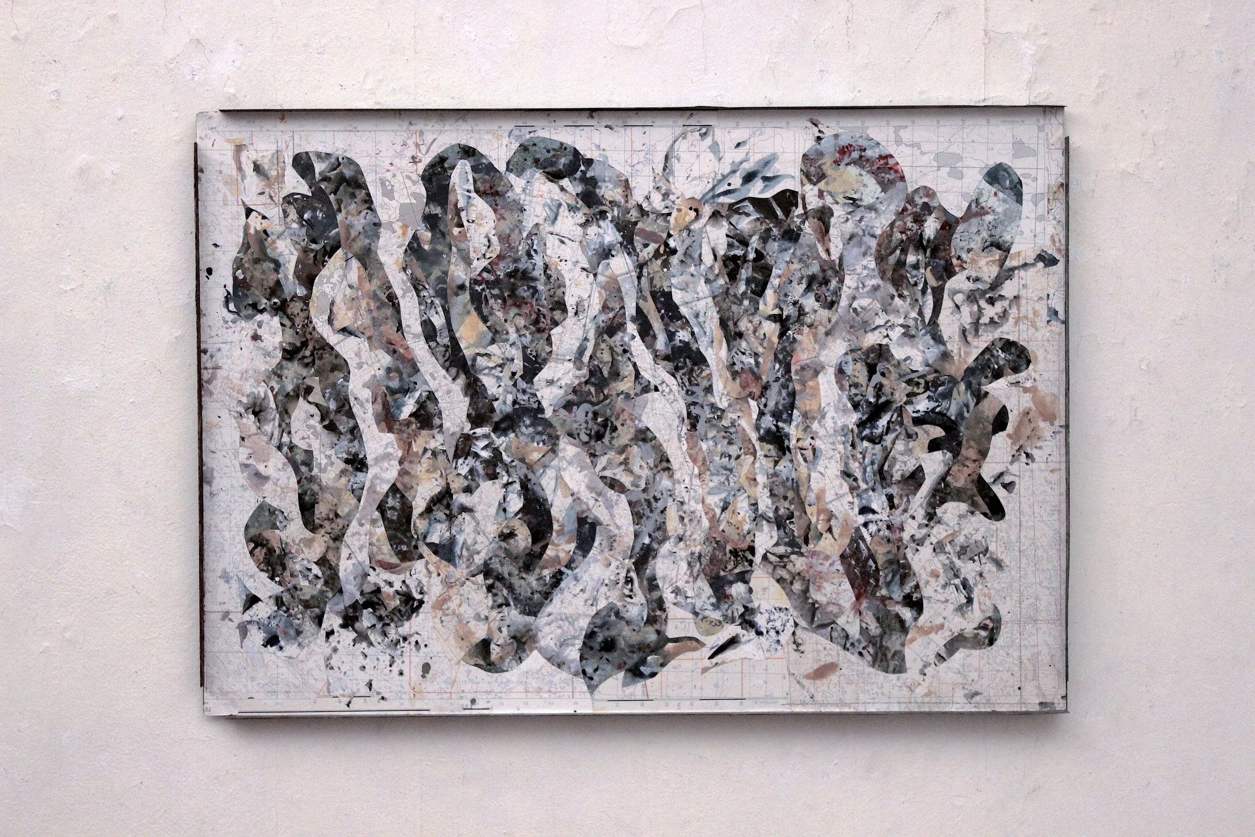 Parnassus, 2019 Oil and cut map paper on metal 19 x 28 x 1"