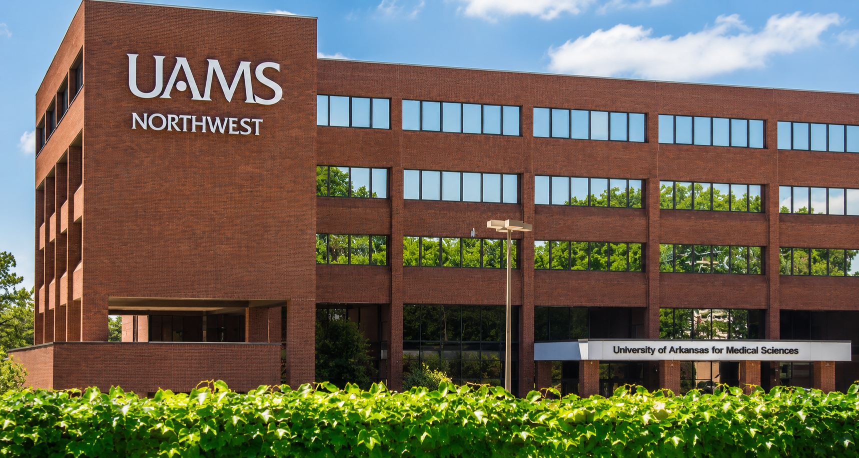 UAMS Northwest building representing the Northwest Arkansas MS Care Clinic initiative and expanded access to multiple sclerosis care for Arkansas patients.