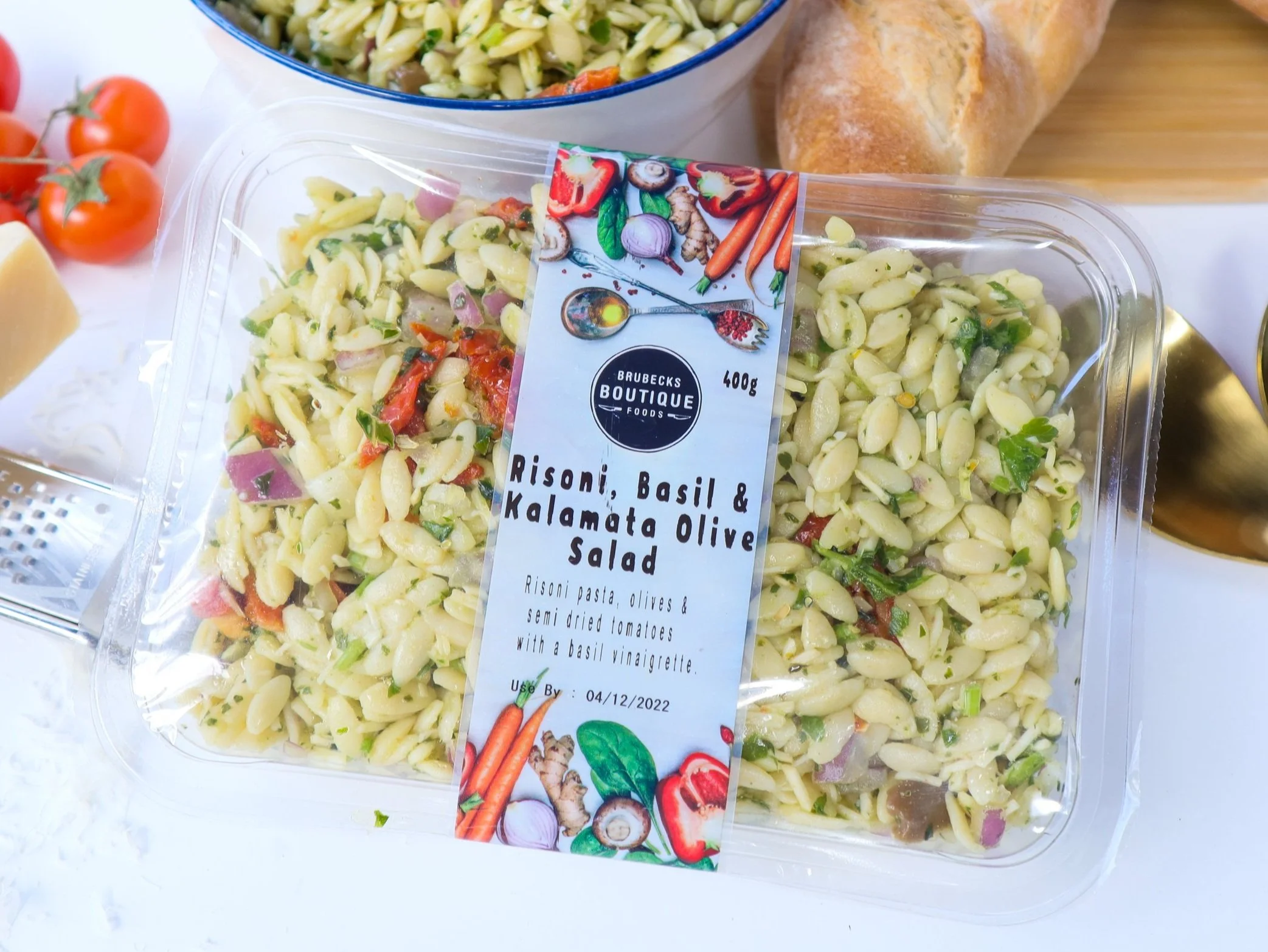 Delicate risonii pasta mixed with classic flavours of the Mediterranean-olives, tomato, basil and lemon juice.