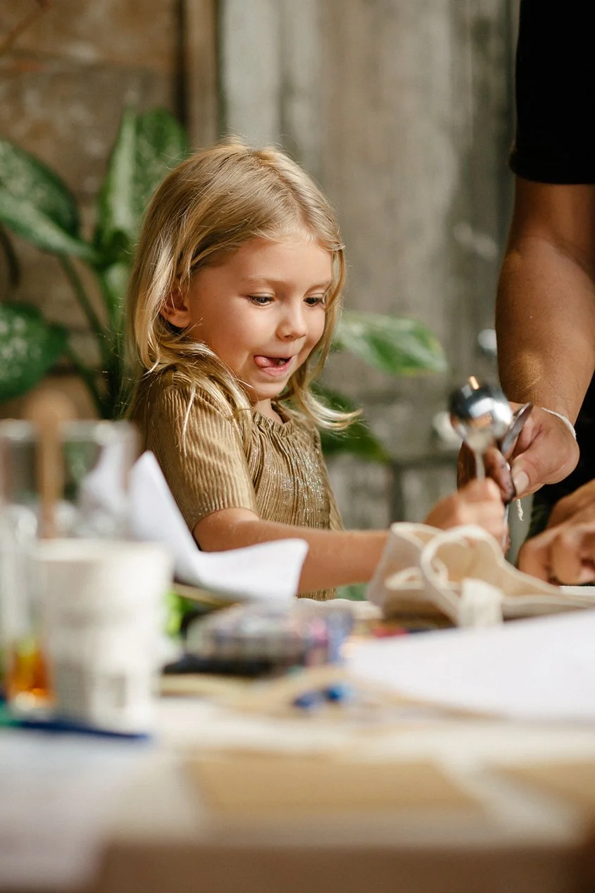 Child creating art, by Suki Zoe