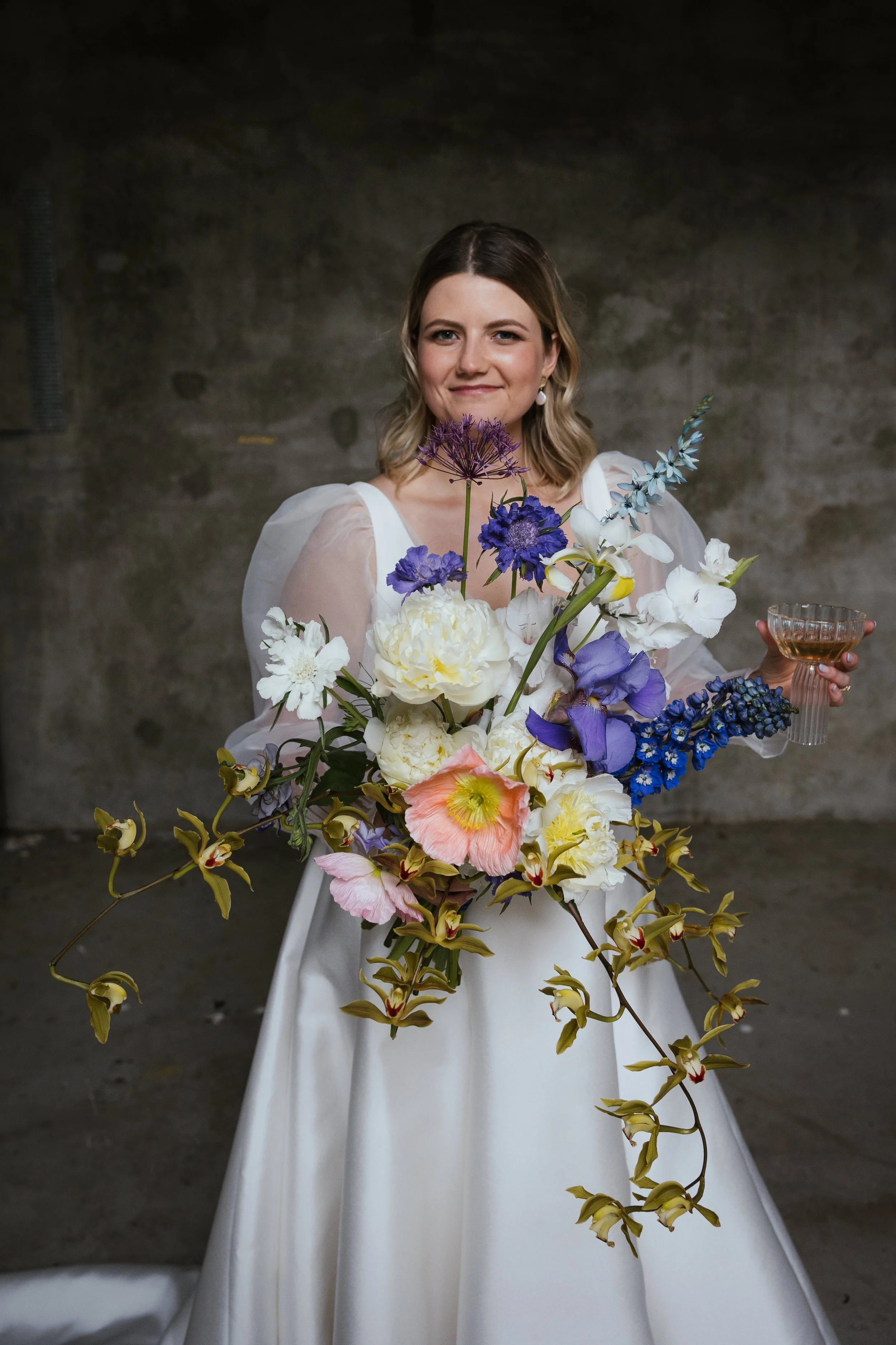 Stunning wedding flowers, hobart elevated wedding florist, contemporary bouquet with orchids and iris

