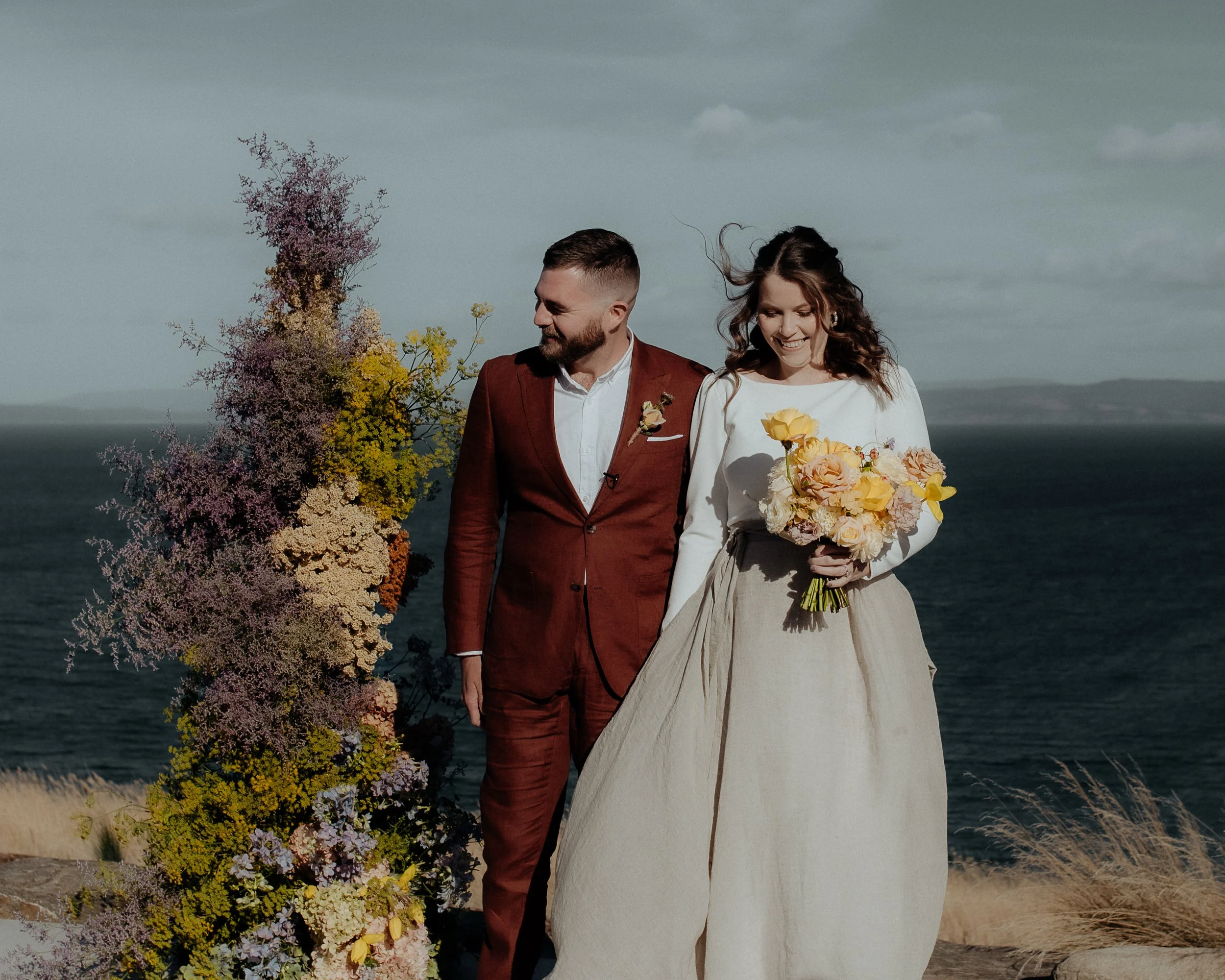 stunning textural ceremony arrangement at The Point Tasmania. Seasonal wedding elopement flowers