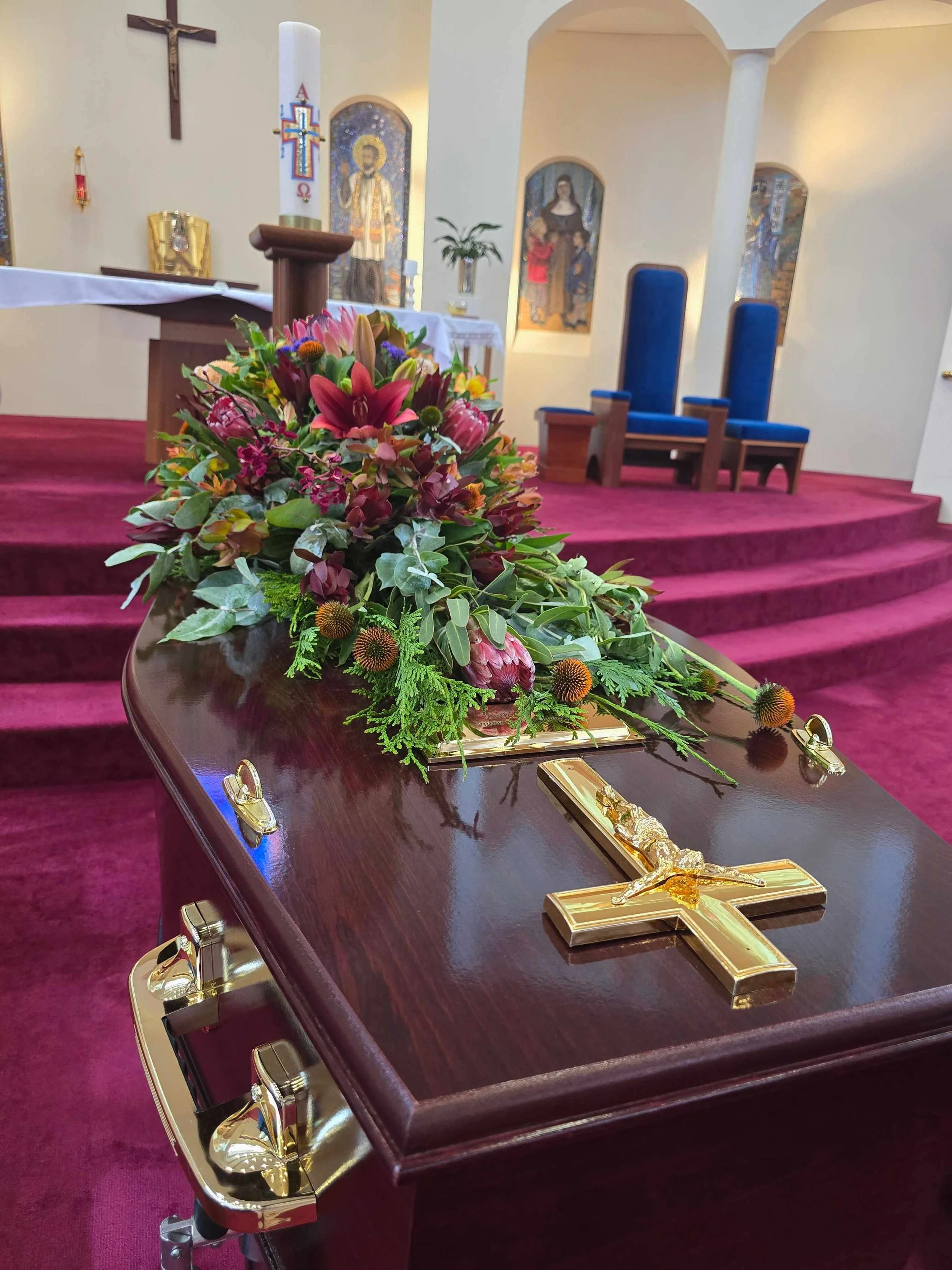 native-flower-tribute-gold-cross-coffin-church-adelaide.jpg