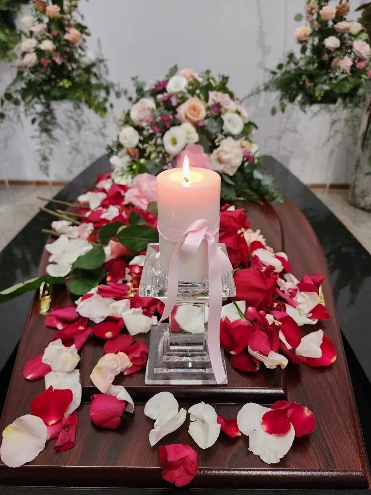 Coffin-With-Petals-Embrace-Funerals.webp