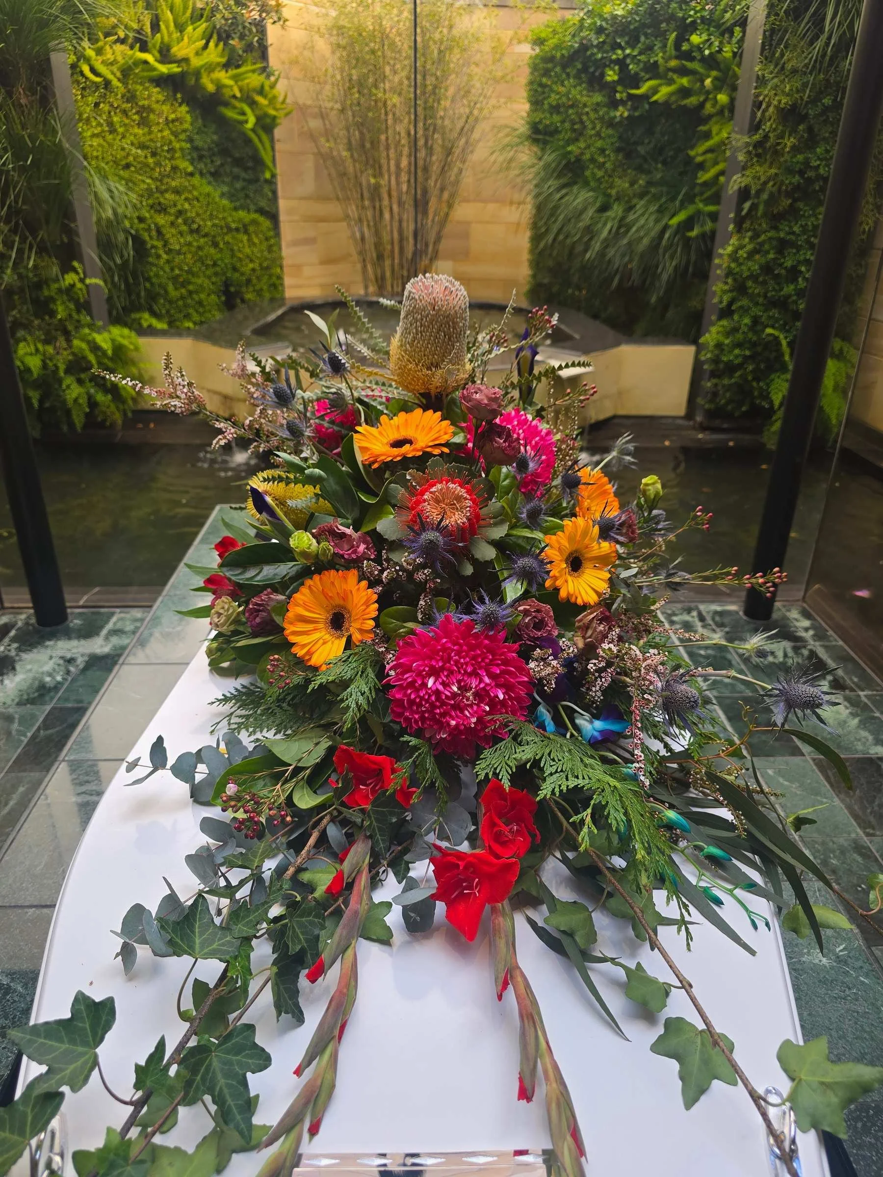 colourful-native-garden-flower-casket-spray-adelaide.jpg