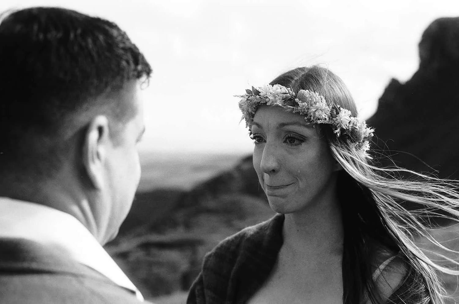 Black and white photograph of an emotional bride during her elopement ceremony