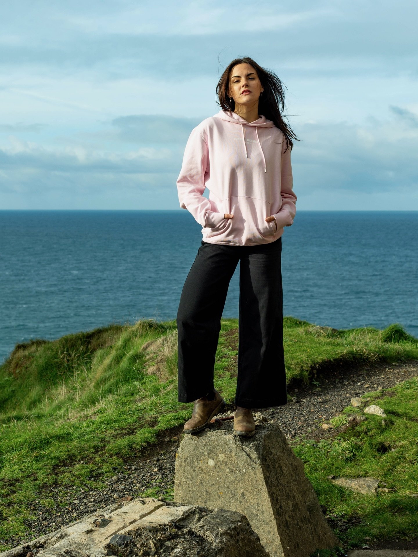 Merry Christmas Eve! 🎄

Getting into the festive spirit, Tara is wearing our Cornish Mermaid Premium Hoodie in Baby Pink, size Medium. 🎁 
Perfect for winter walks, fireside lounging, and all those in-between moments. 

Explore the full range of col