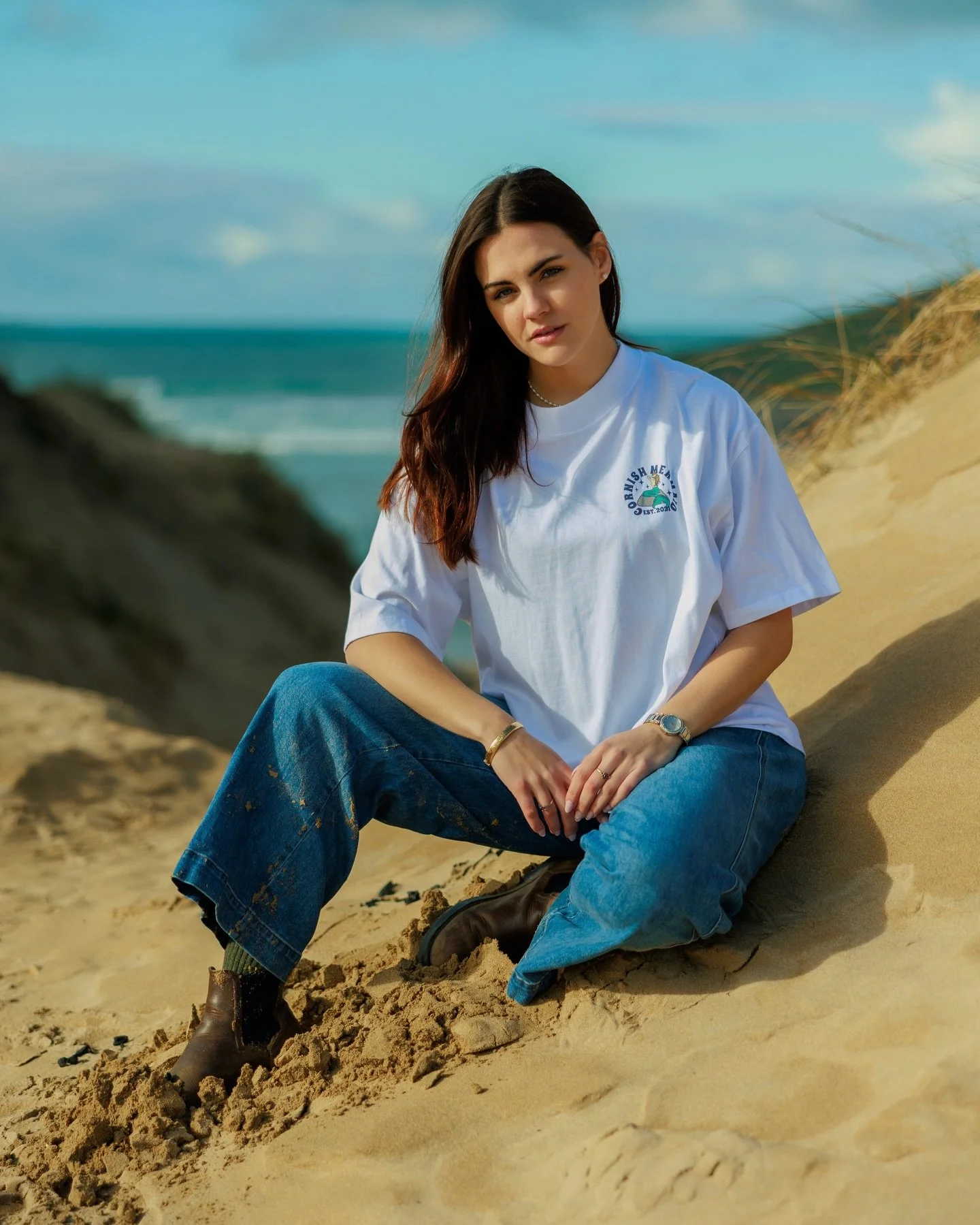 White tee weather forever 🏖️

Embrace the spirit of Cornwall with our Godrevy Lighthouse &ldquo;Cornish Mermaid&rdquo; Tee. Inspired by the iconic lighthouse overlooking St Ives Bay, this design blends coastal beauty with folklore charm. Featuring a