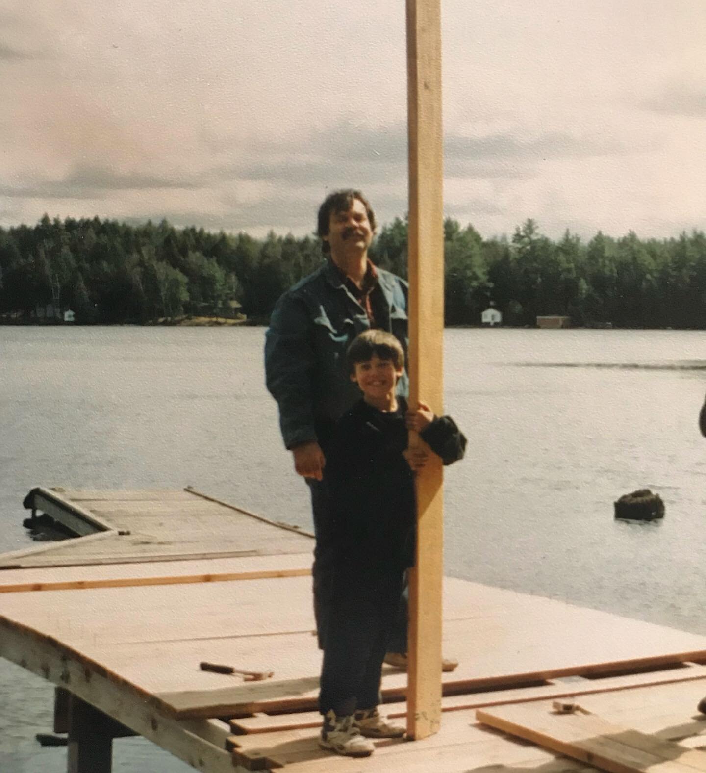 Proof that @northcountrydocks owner has been doing this a long time, here he is building his first dock with his dad on #catchacomalake in the 90s. Thirty years of experience lets you know your dock is in safe hands with us! #theygrowuptoofast #dock 