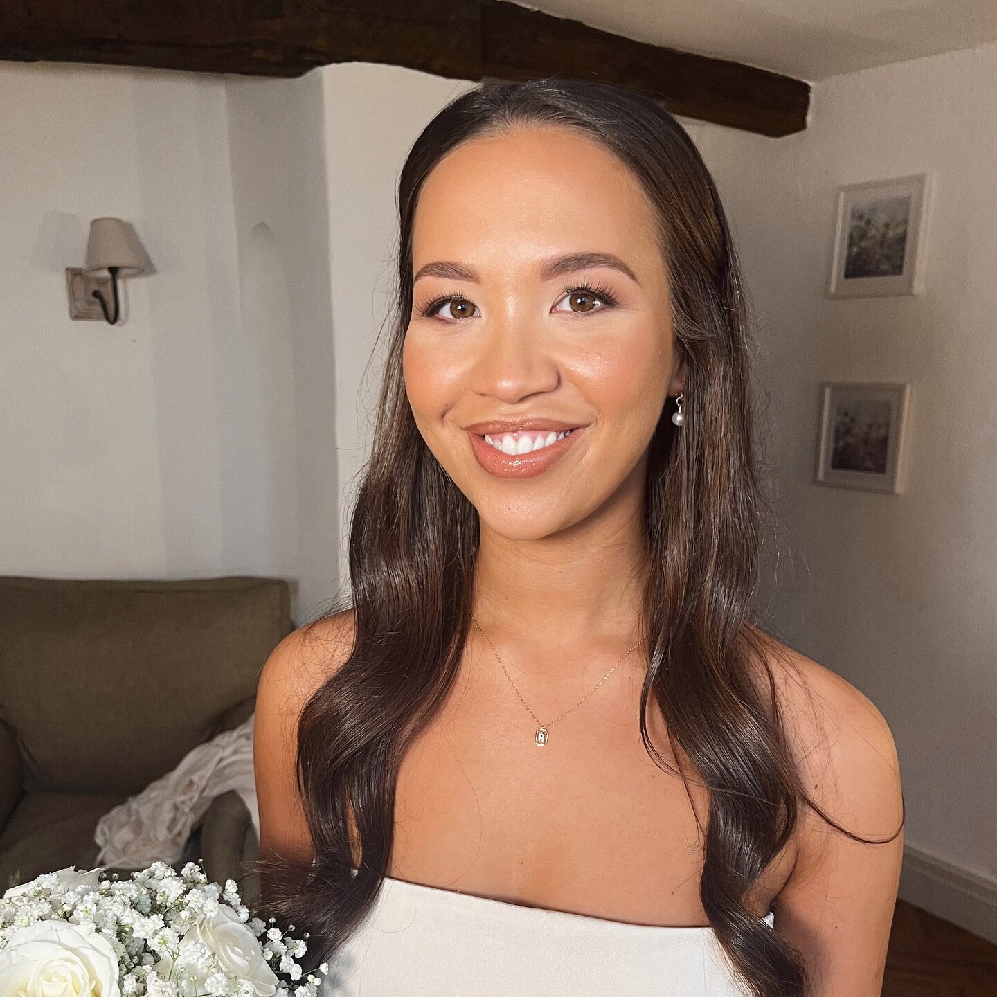 R h i a n n a . . . 

Gorgeous, glossy waves paired with a beautiful, bronzed complexion. 

We adore this style as it&rsquo;s natural, radiant and timeless. Hit the SAVE button if you adore it too! 

🤎

#styledsisters #bridesmaidmakeup #bridesmaidha