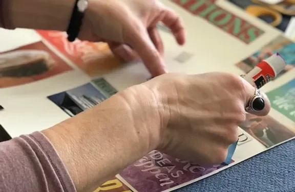 Vision board materials including collage supplies during the Vision Board for 2026 experience at Loopwell
