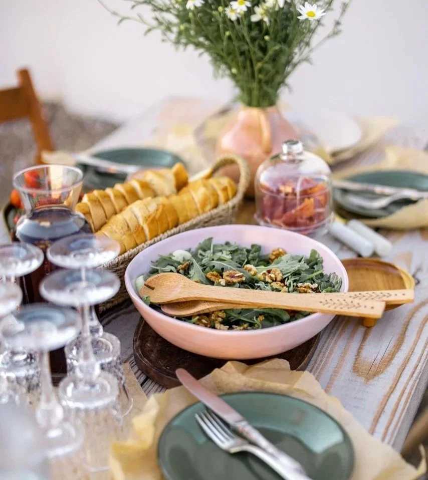 Beautifully+Served+Wooden+Table+with+Food+and+Dishes+in+Natural+Boho+Style+Outdoors.jpg