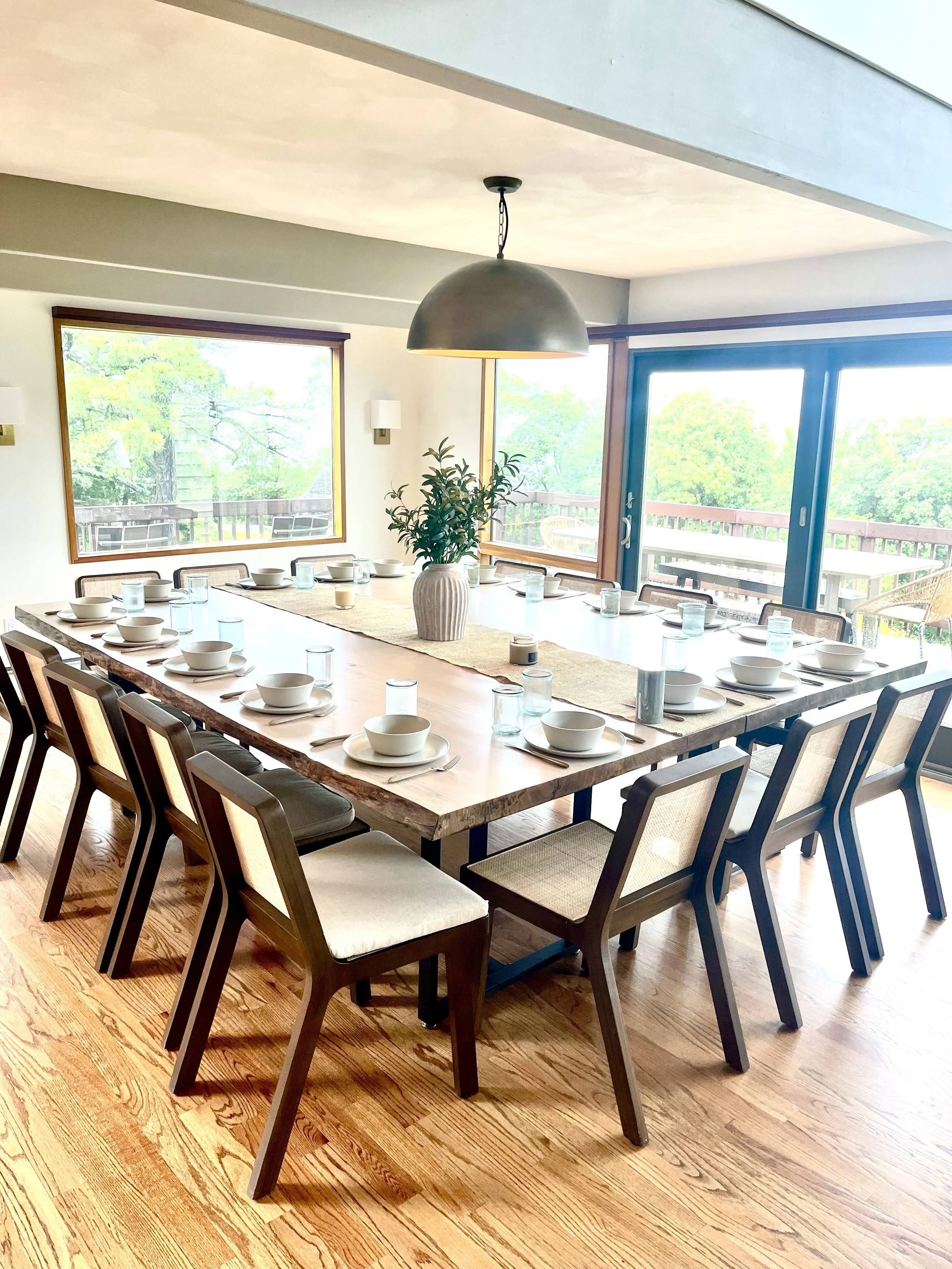 Dining table prepared for shared meals during a couples wellness retreat at Loopwell