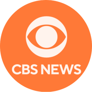 CBS News logo with an orange background, featuring the CBS eye symbol and the text 'CBS NEWS' below it.