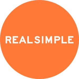 Orange circle with white text that says 'REAL SIMPLE'