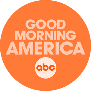 Orange circular logo with white text reading "Good Morning America" and a small ABC logo at the bottom.